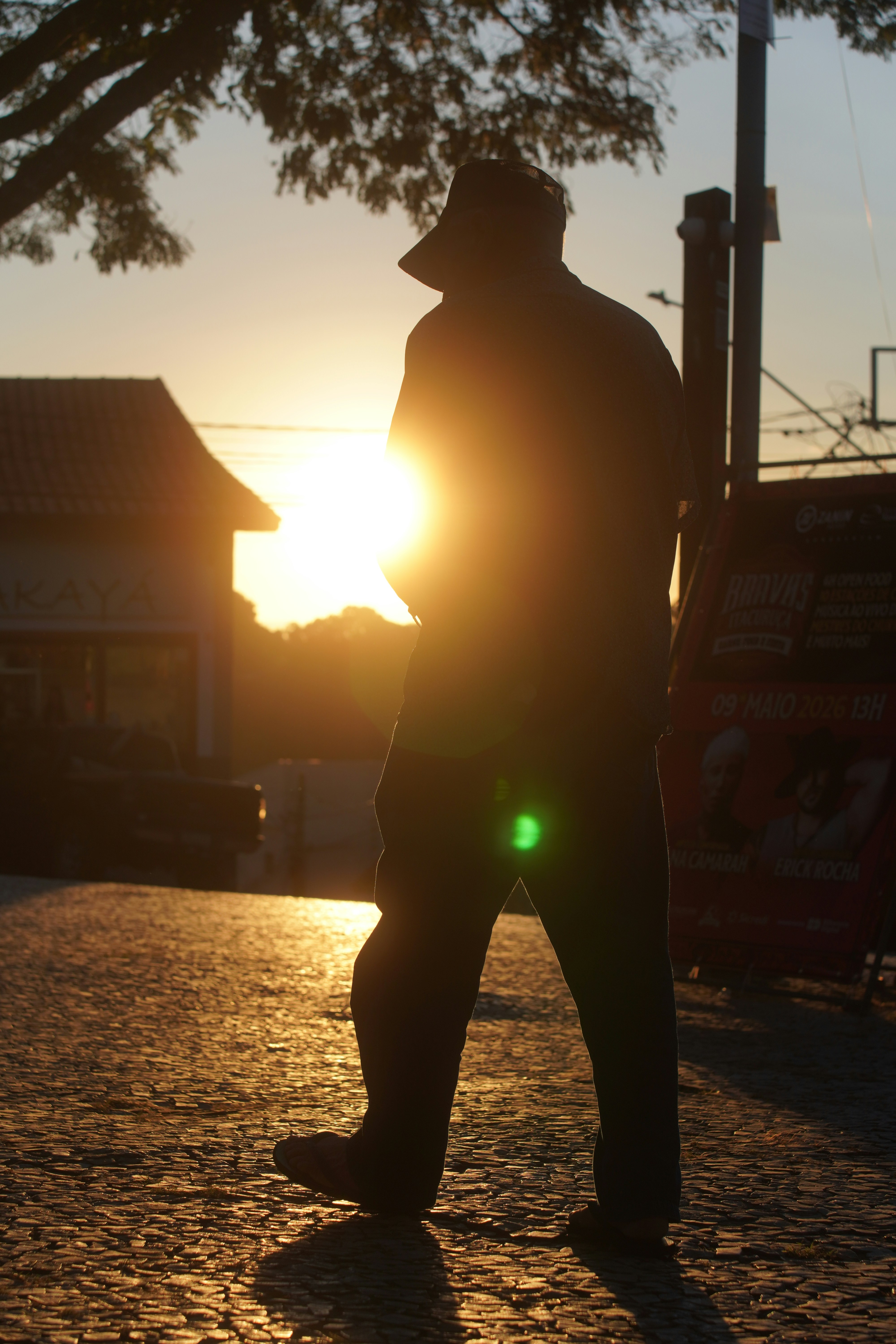 Silhouette of a man walking at sunset
