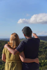 Couple looking out at a scenic landscape