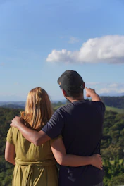 Couple looking out at a scenic landscape