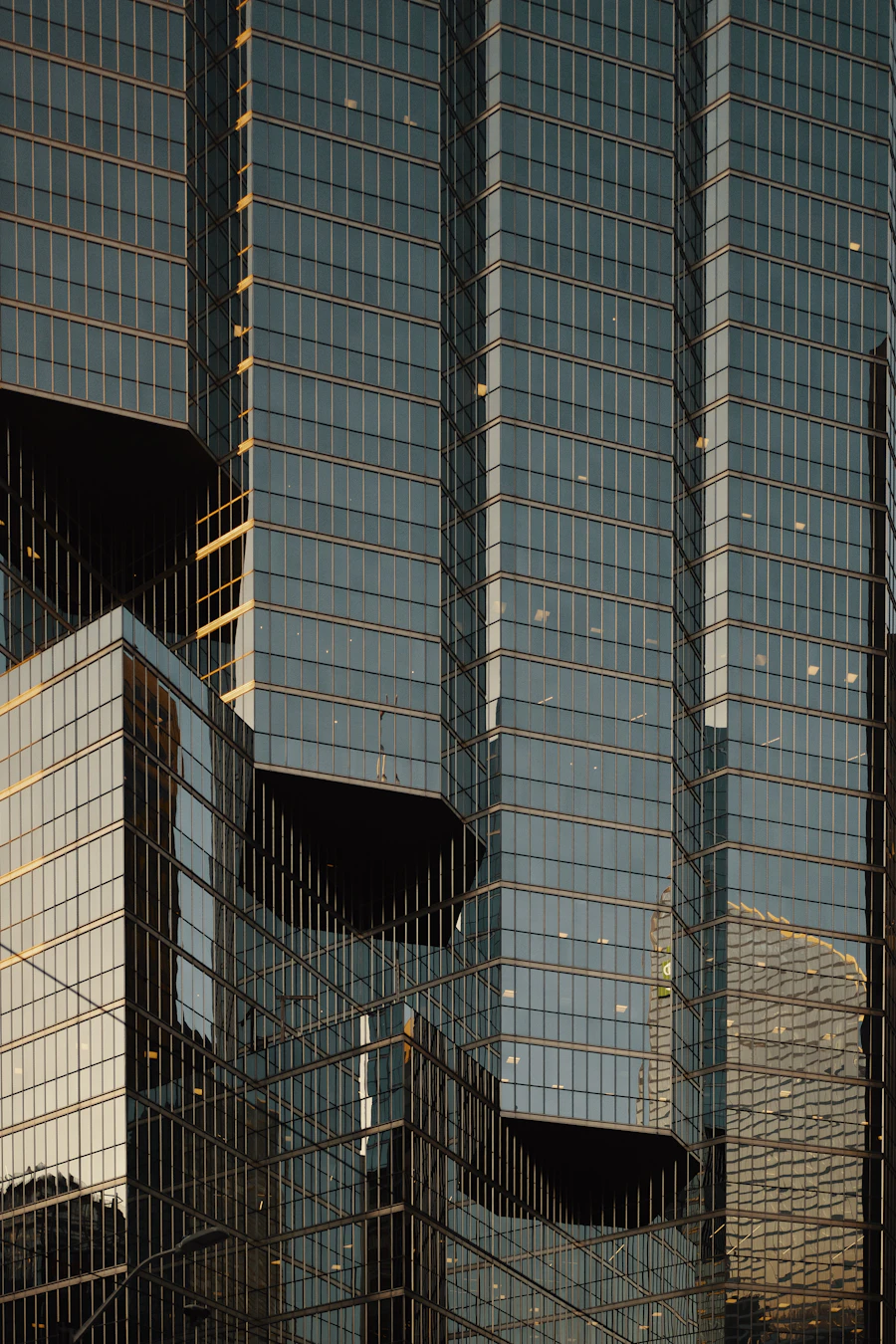 High-rise residential glass tower at sunset