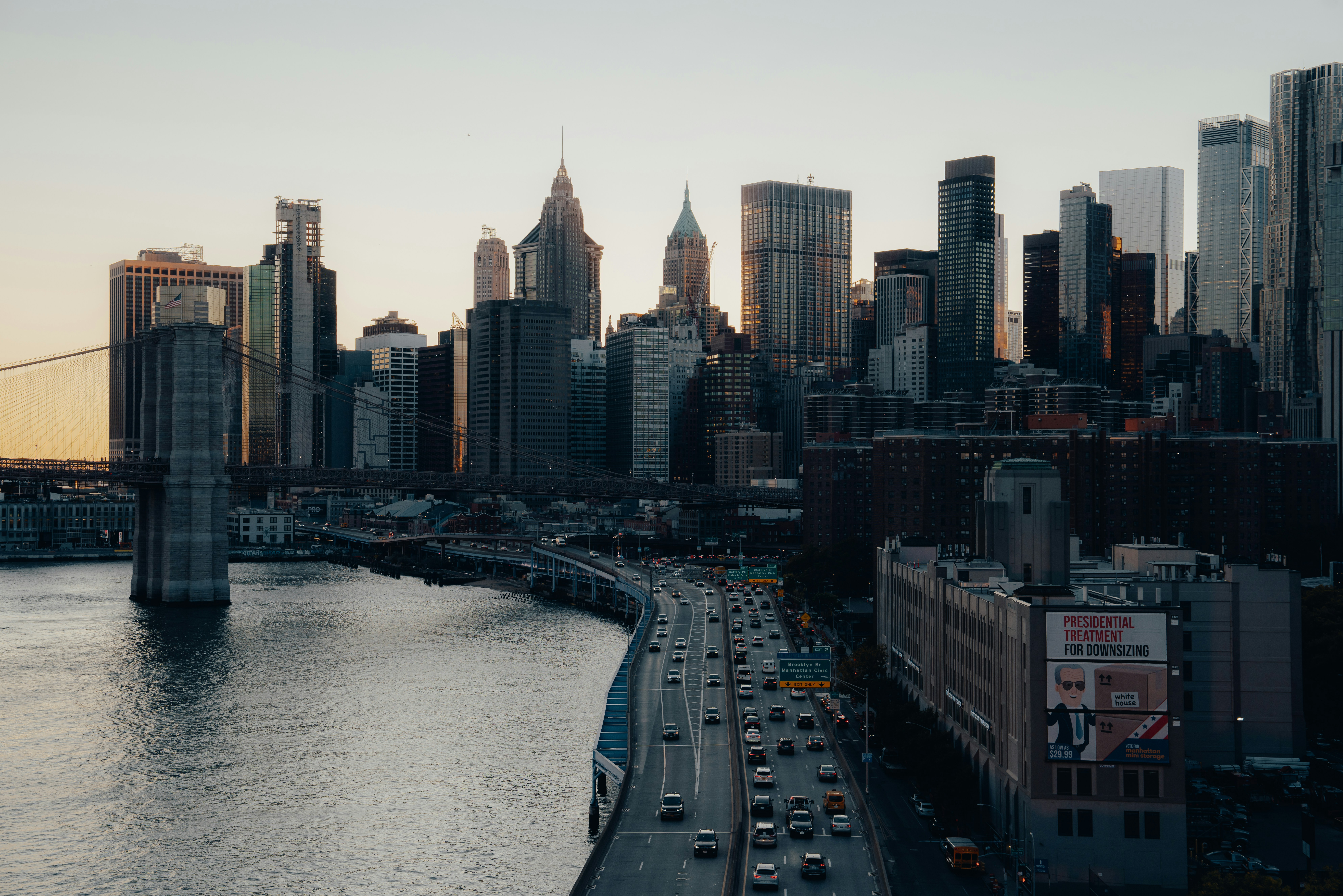 New york city skyline with bridge and highway traffic.