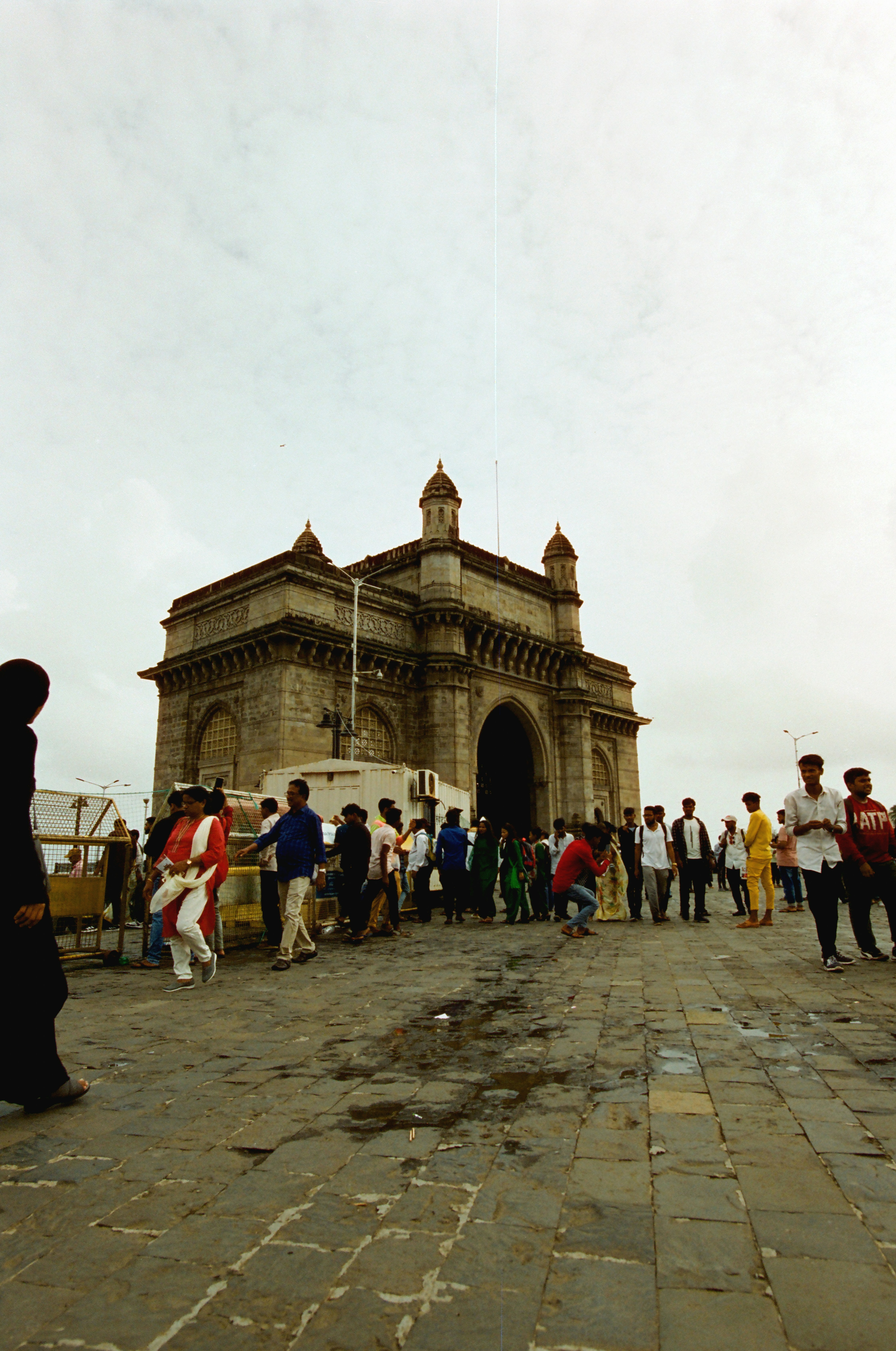People gathered at the gateway of india monument