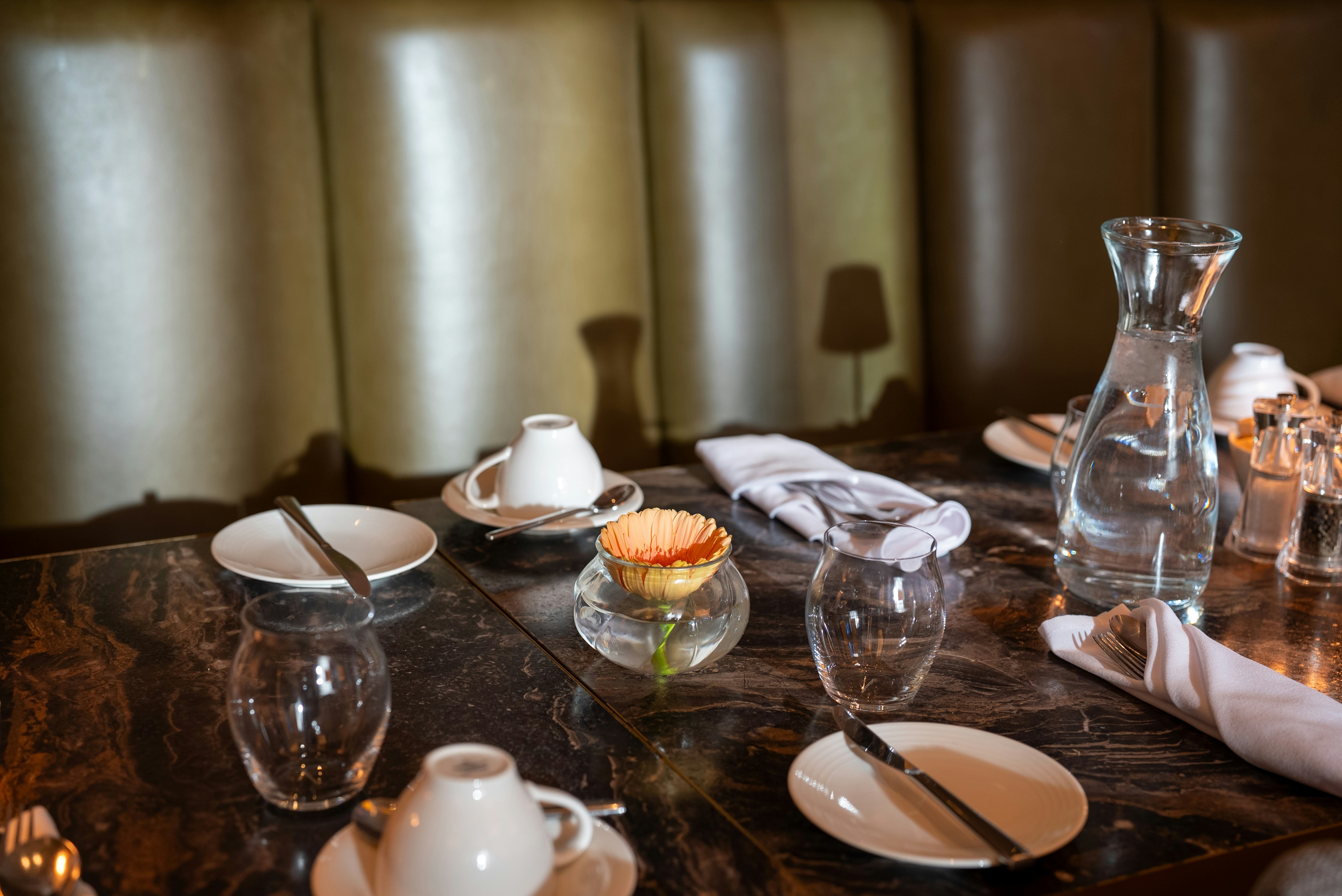Table setting with dessert and drinks at a restaurant