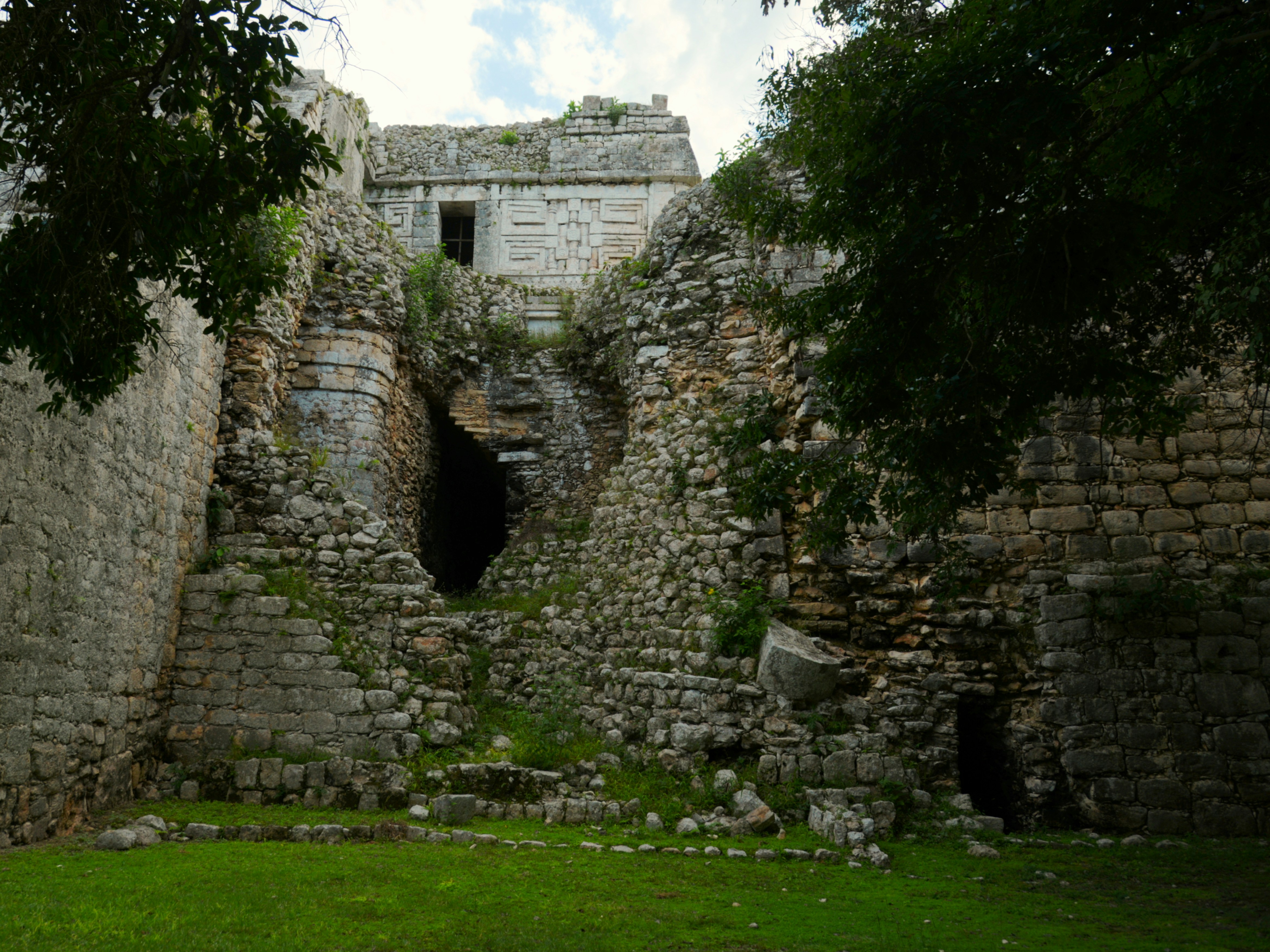 Ancient stone ruins overgrown with greenery