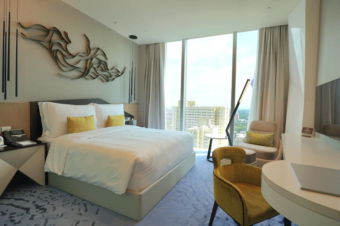 Modern hotel room with city view representing travel accommodation