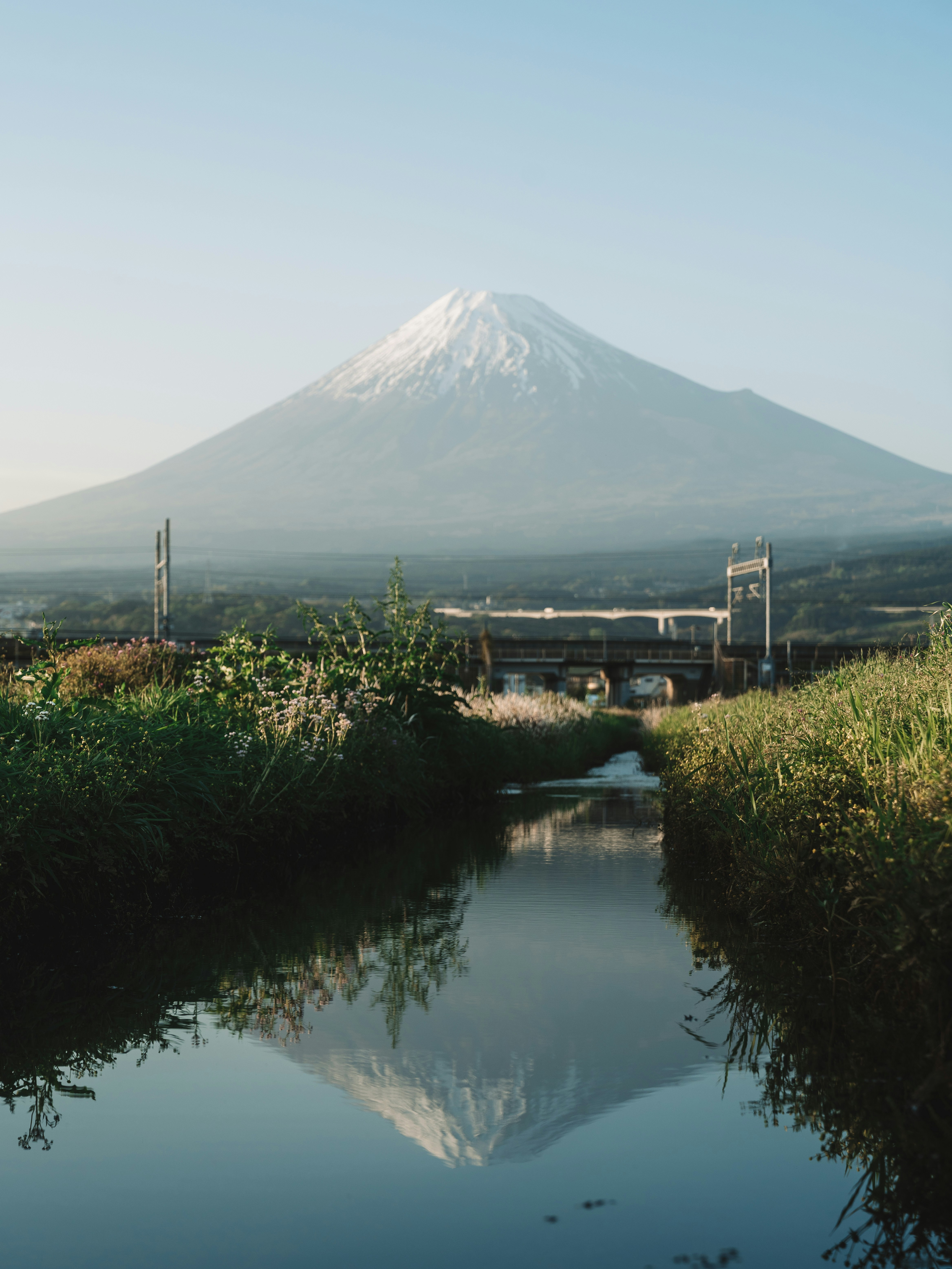 Mount fuji reflected in a calm stream