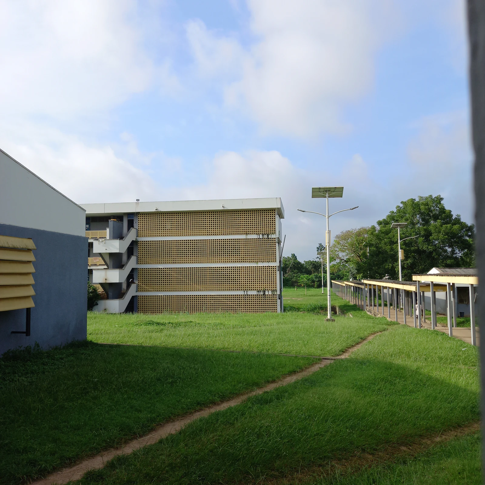 Modern university building with an outdoor walkway