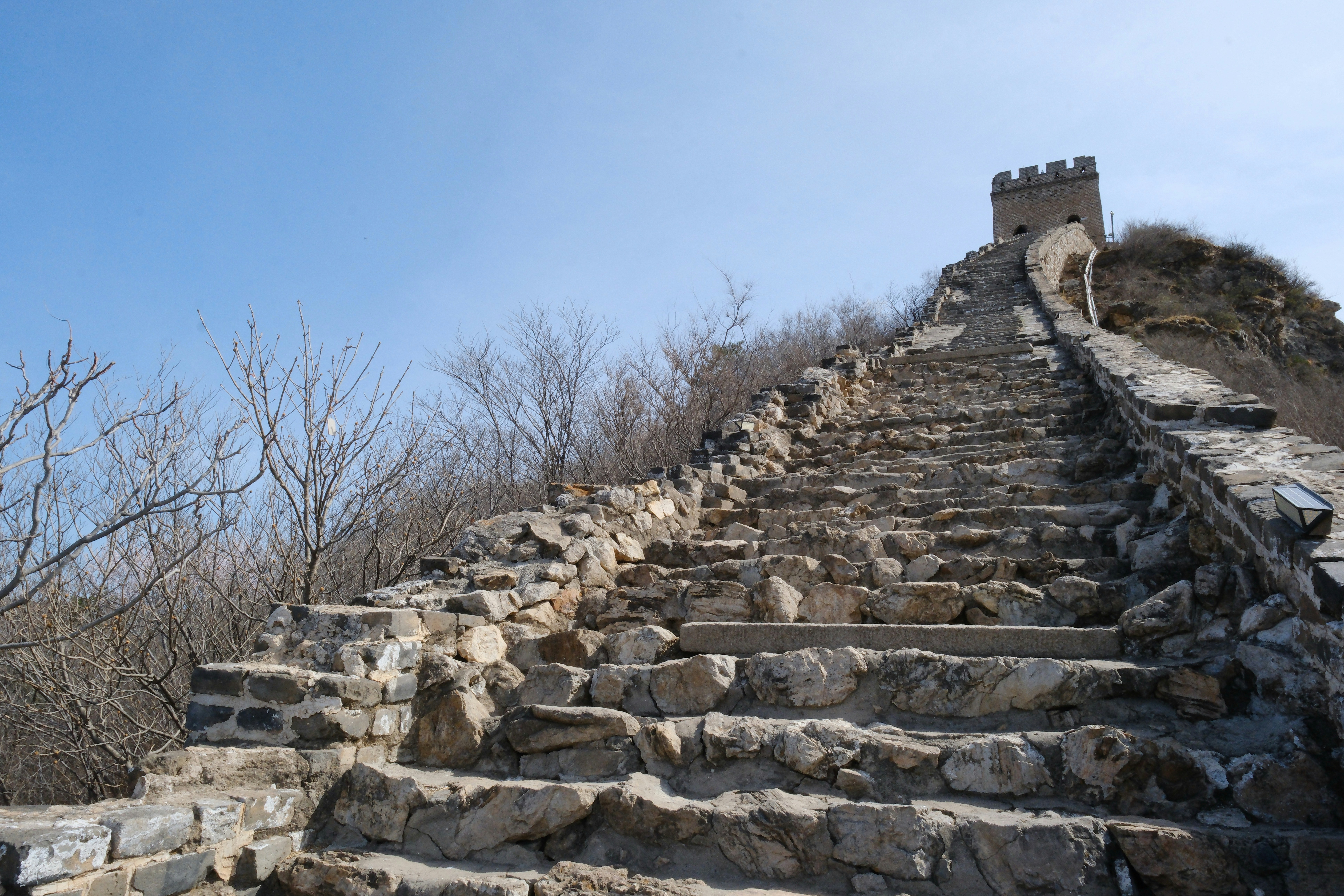 Stone stairs ascend the great wall of china