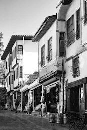Black and white street scene with traditional buildings