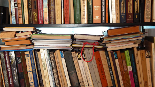 A bookshelf filled with old books