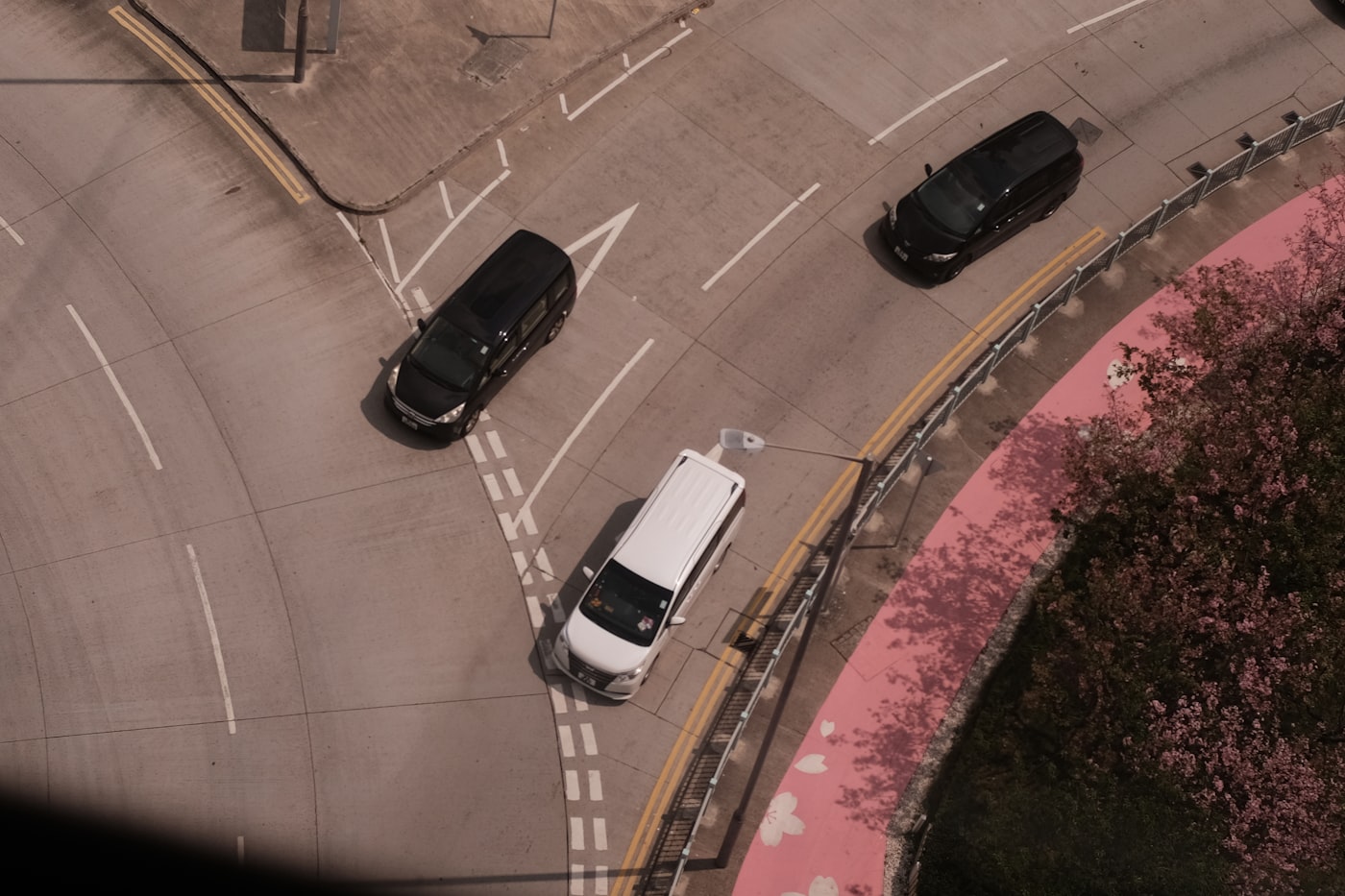White Zeekr RT minivan displaying external lidar sensors and camera arrays mounted along the roofline.