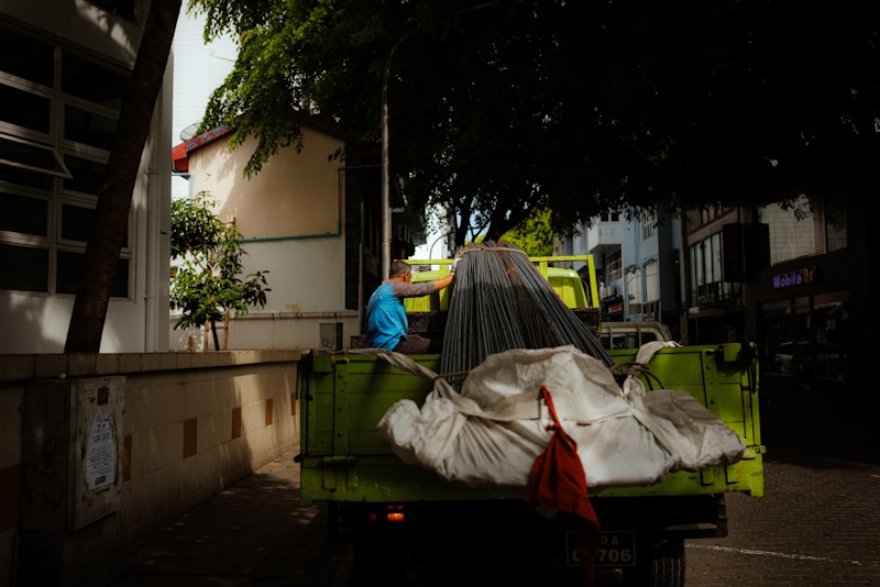 Truck loaded with covered building materials for site delivery