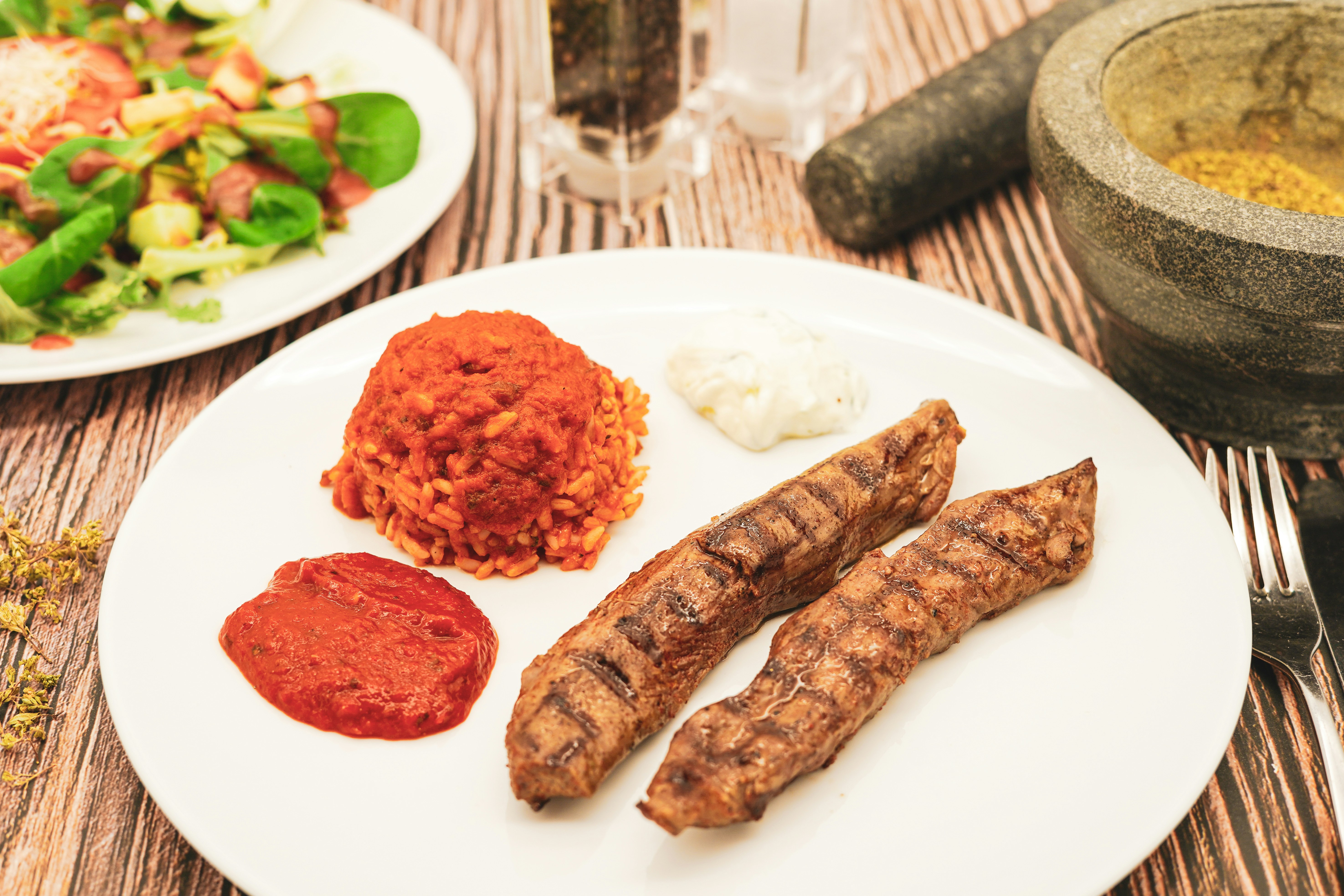 Lebanese grilled lamb with rice and salad