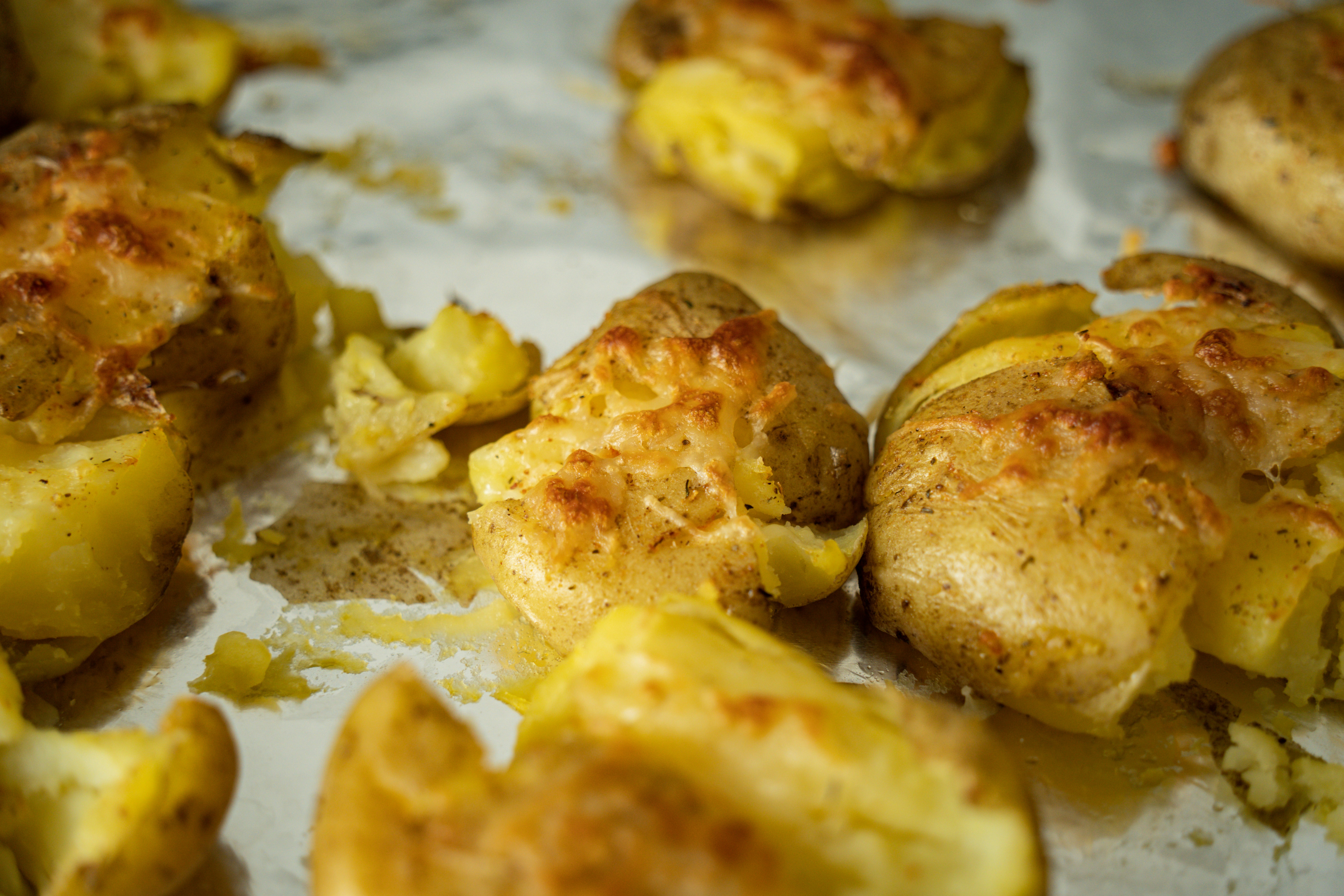 Crispy smashed potatoes with herbs and spices