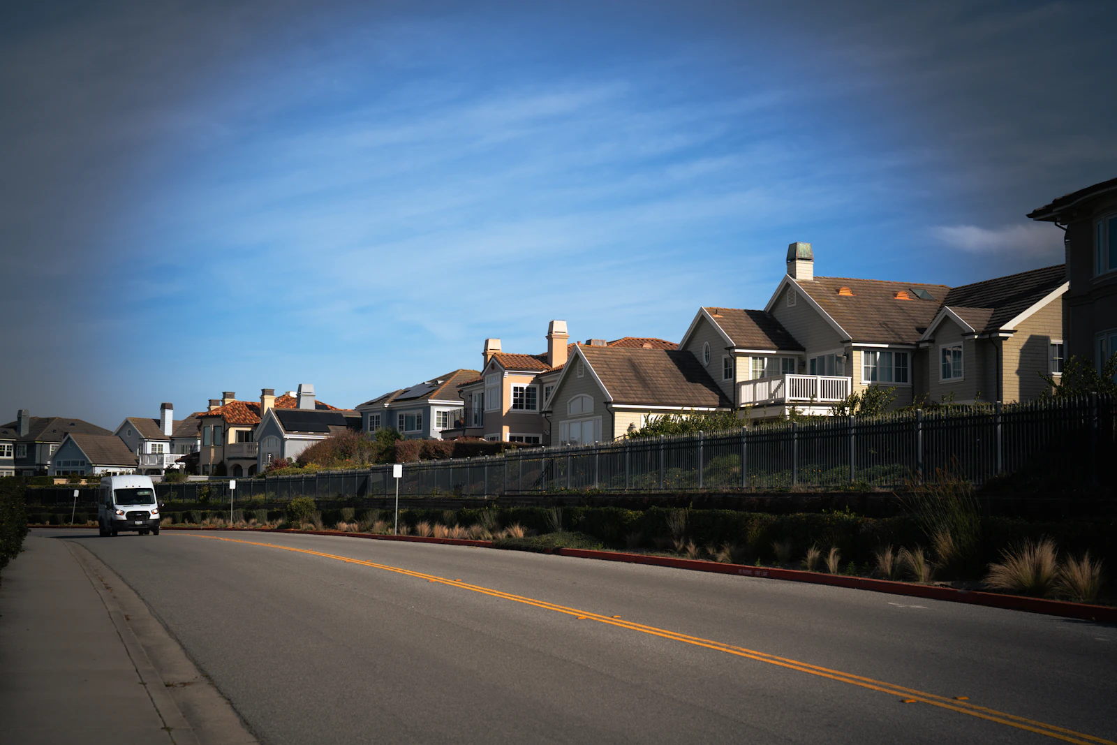 Paved community road with yellow center line
