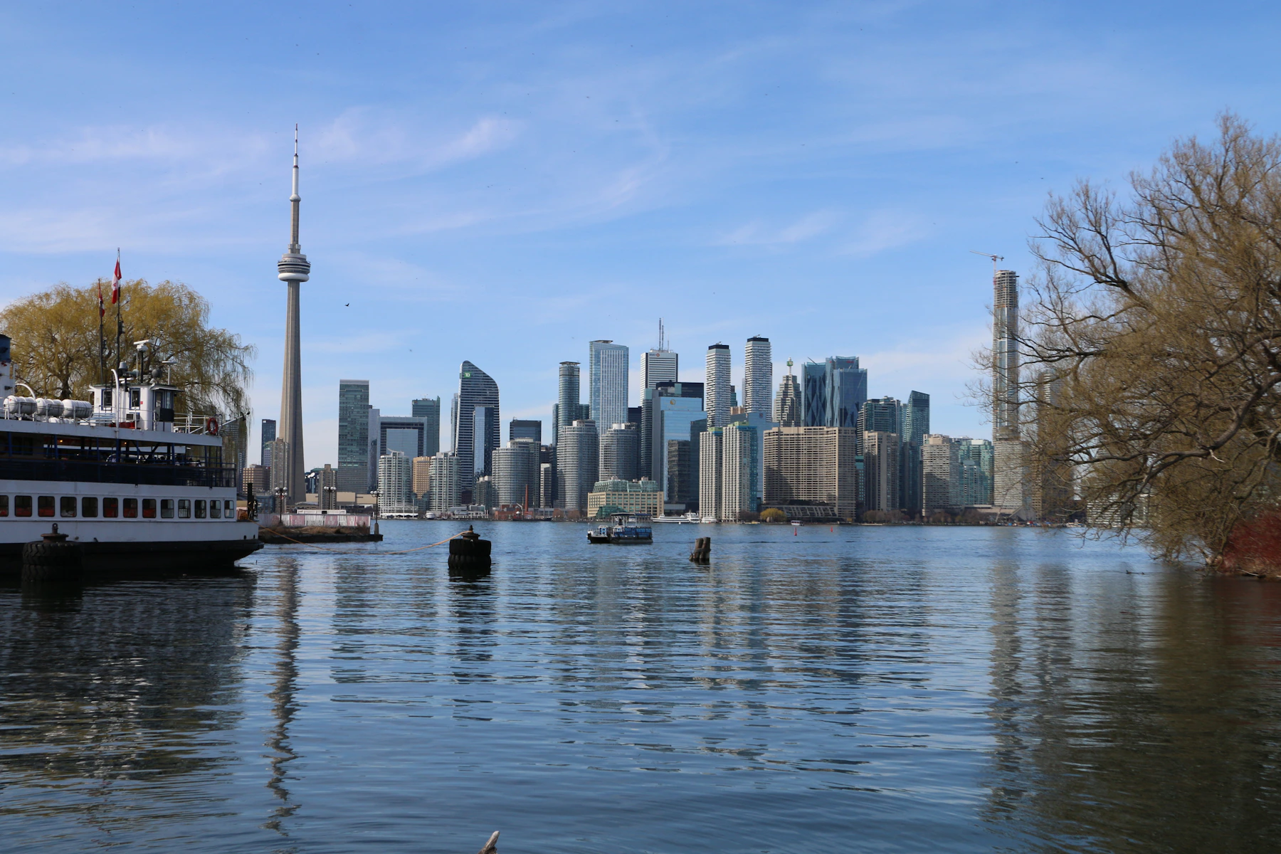 Toronto skyline and CN Tower seen across the water from the Toronto Islands