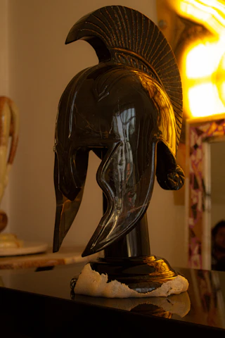 Ancient greek helmet on display indoors display