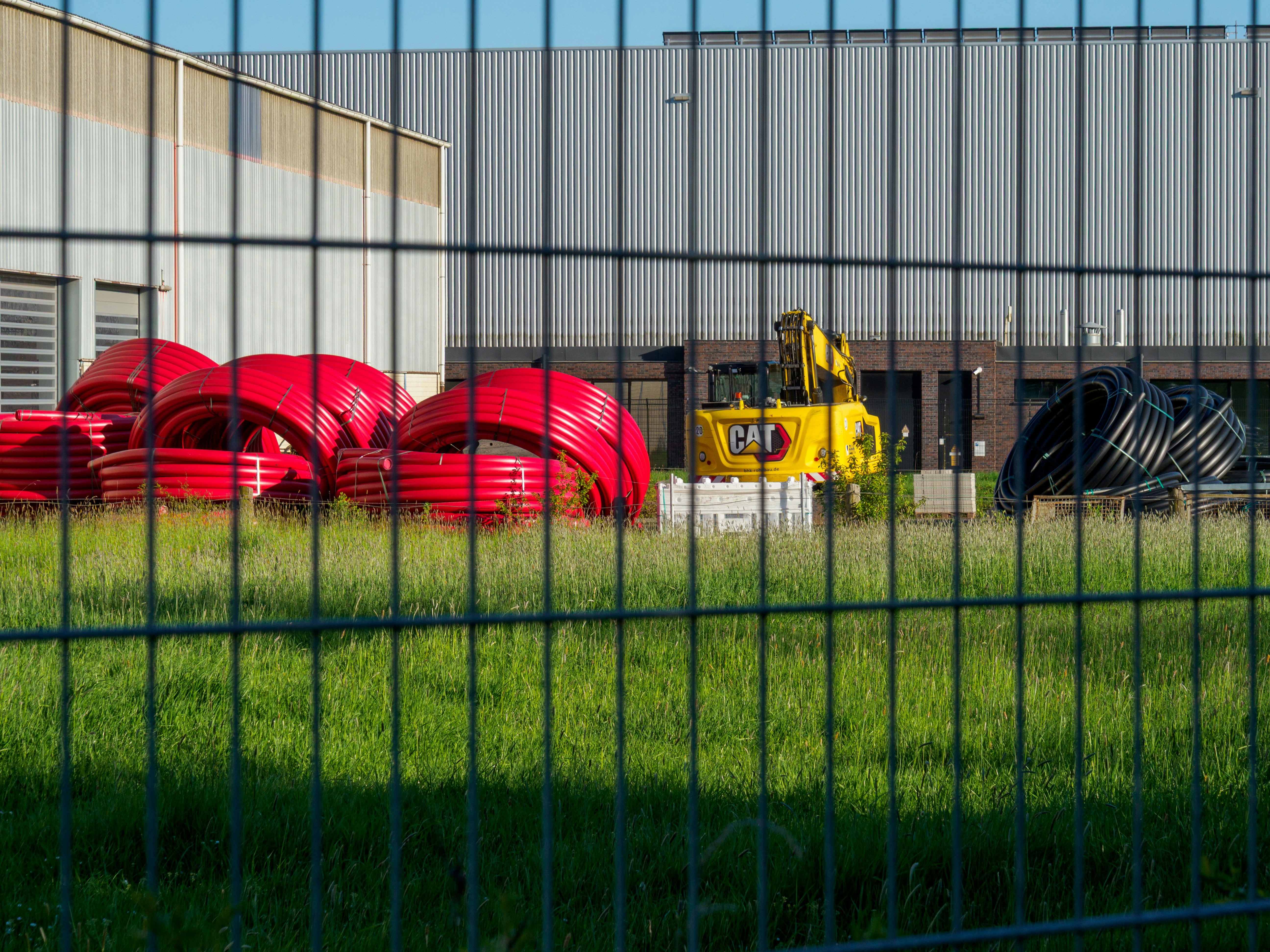 Industrial facility behind perimeter security fencing