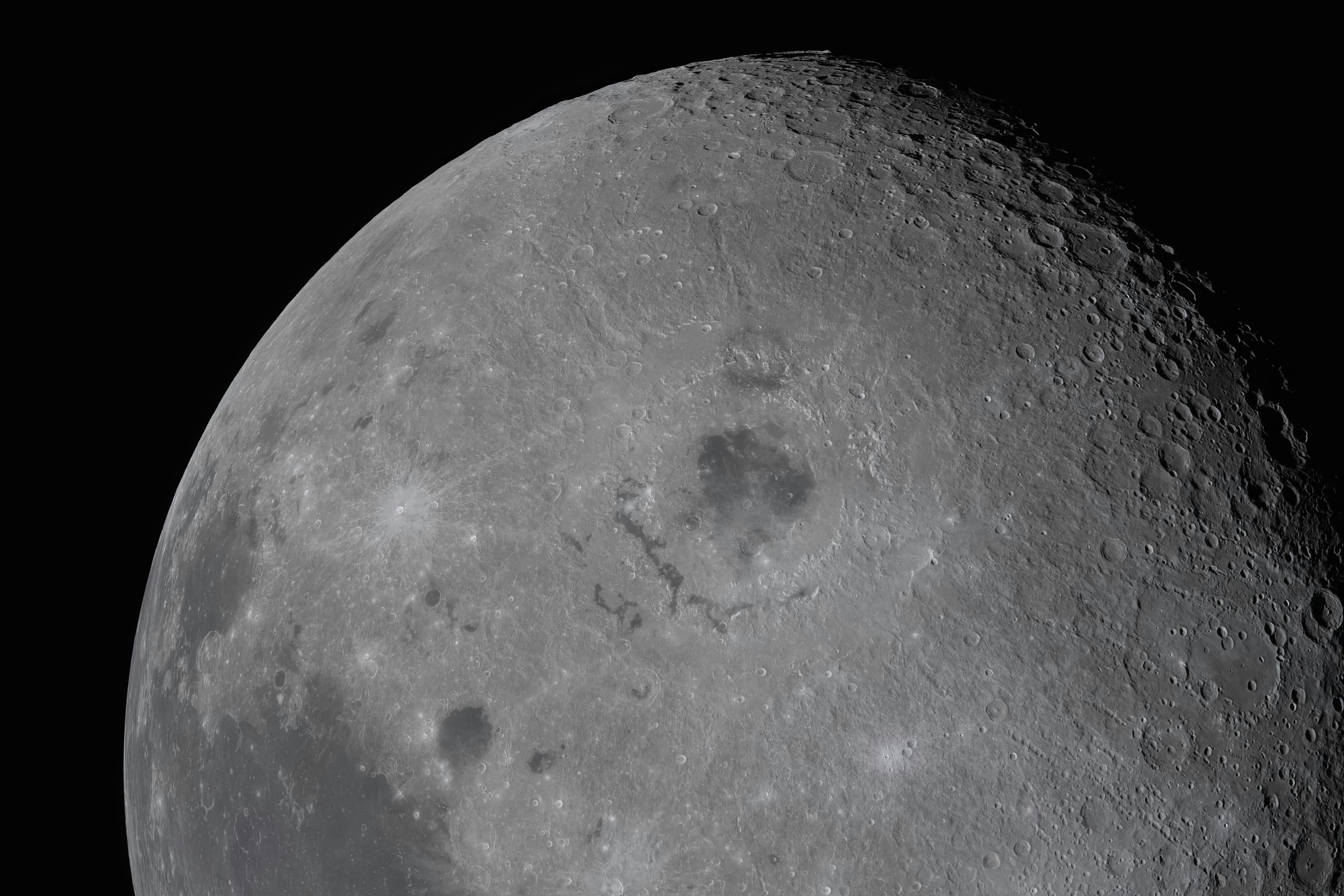Close-up view of the moon's surface with craters.