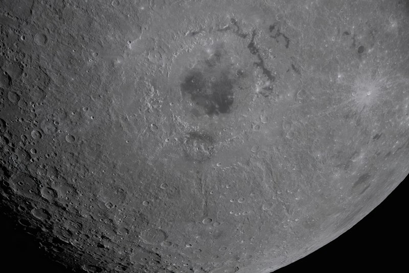 Detailed close-up of the Moon's cratered surface