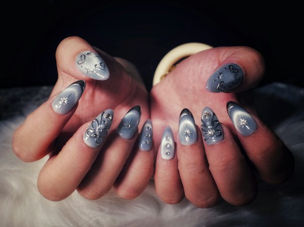 Grey-blue nails with rhinestone crystal accents