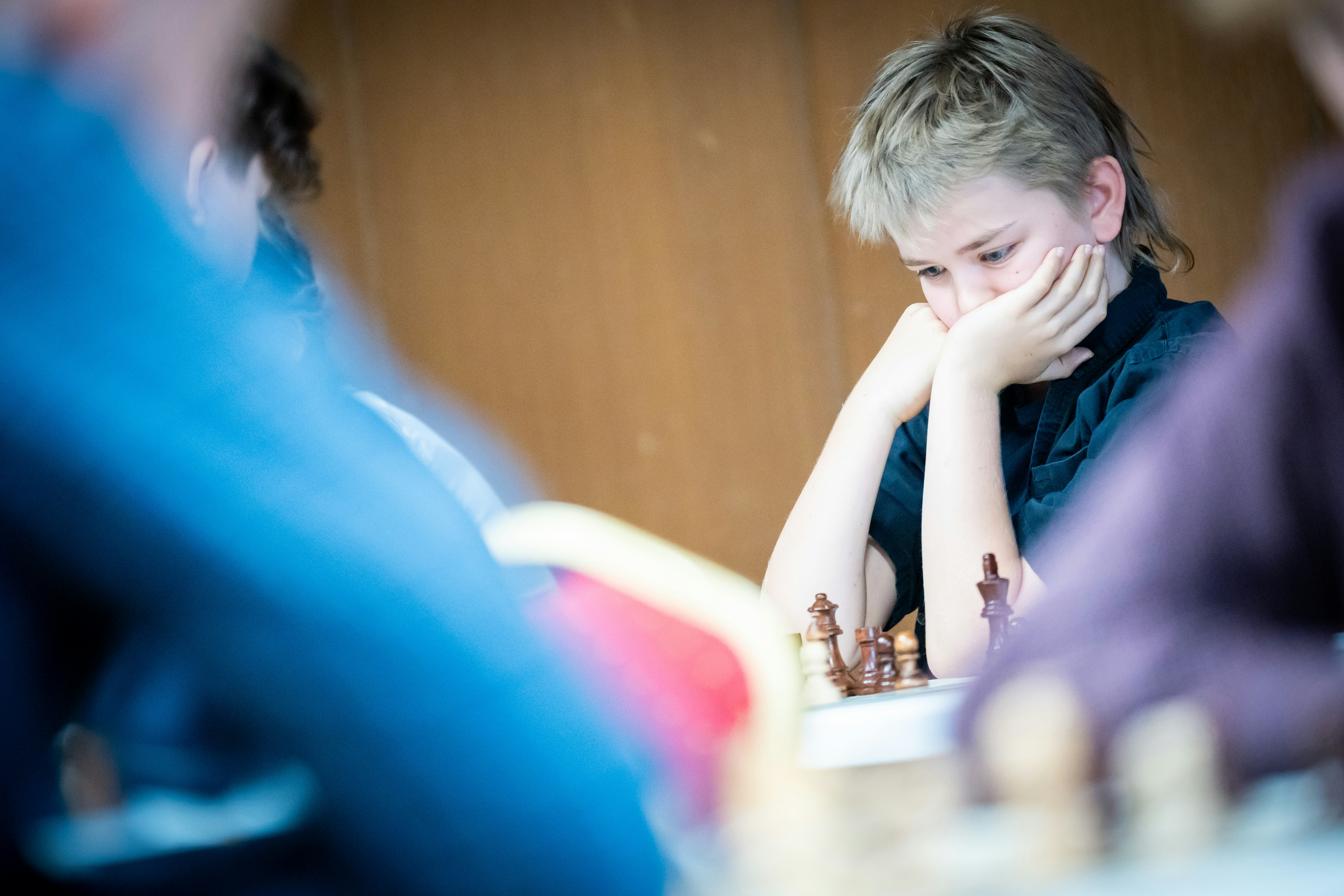 student studying chess