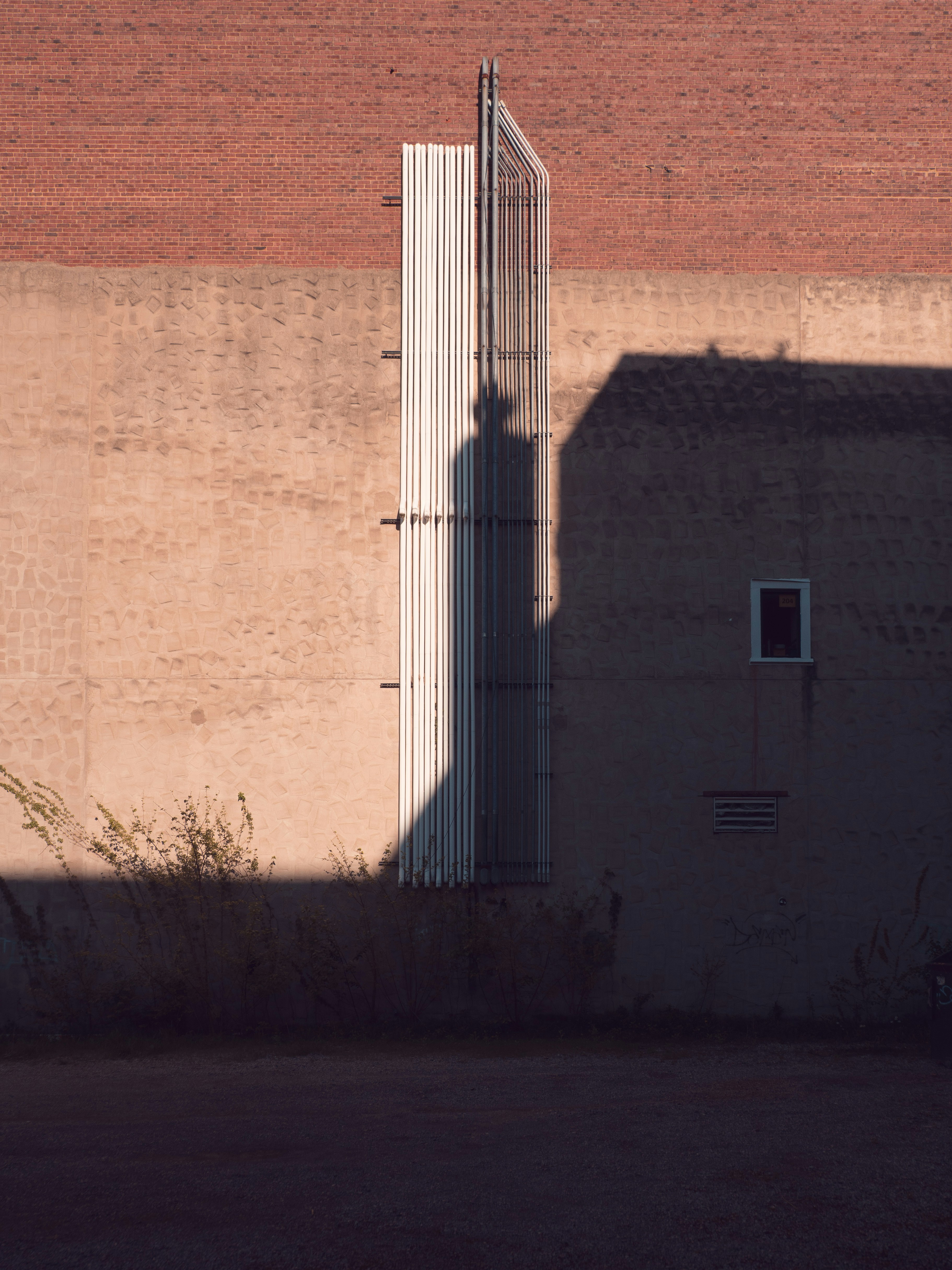 Shadow of a person on a building wall