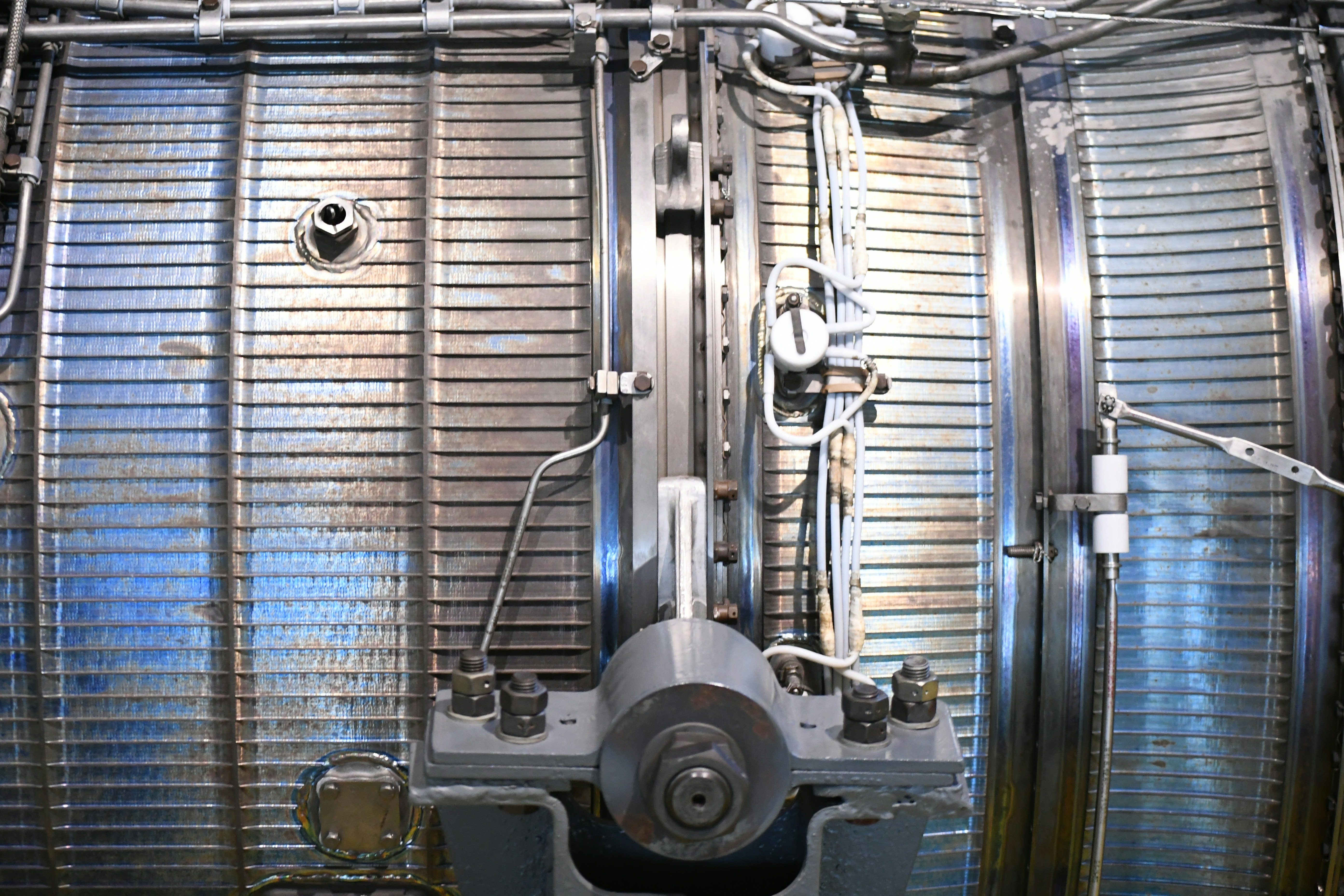 Industrial machinery with pipes and metal walls
