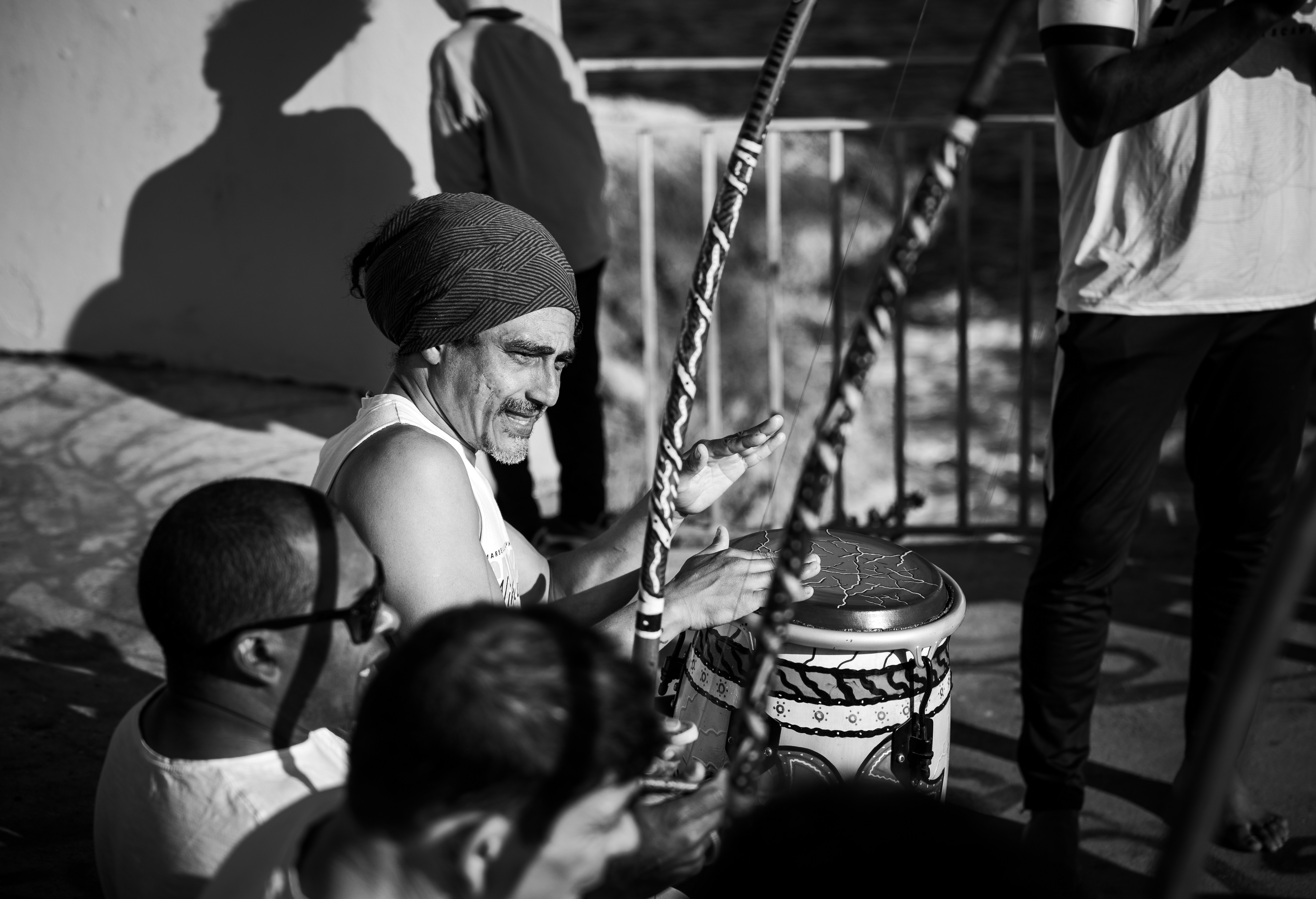 Musicians playing instruments in a gathering