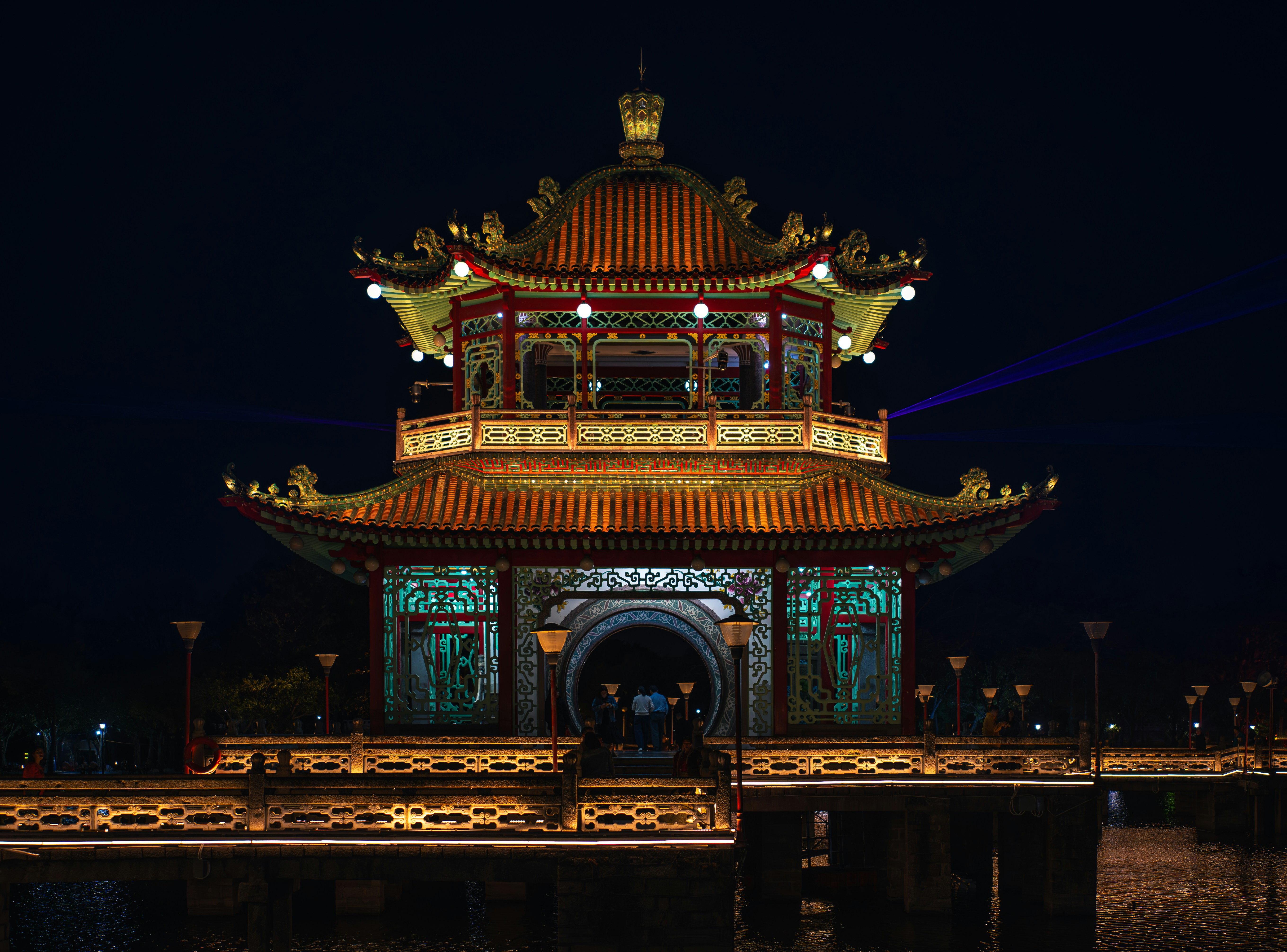 Ornate traditional building illuminated at night
