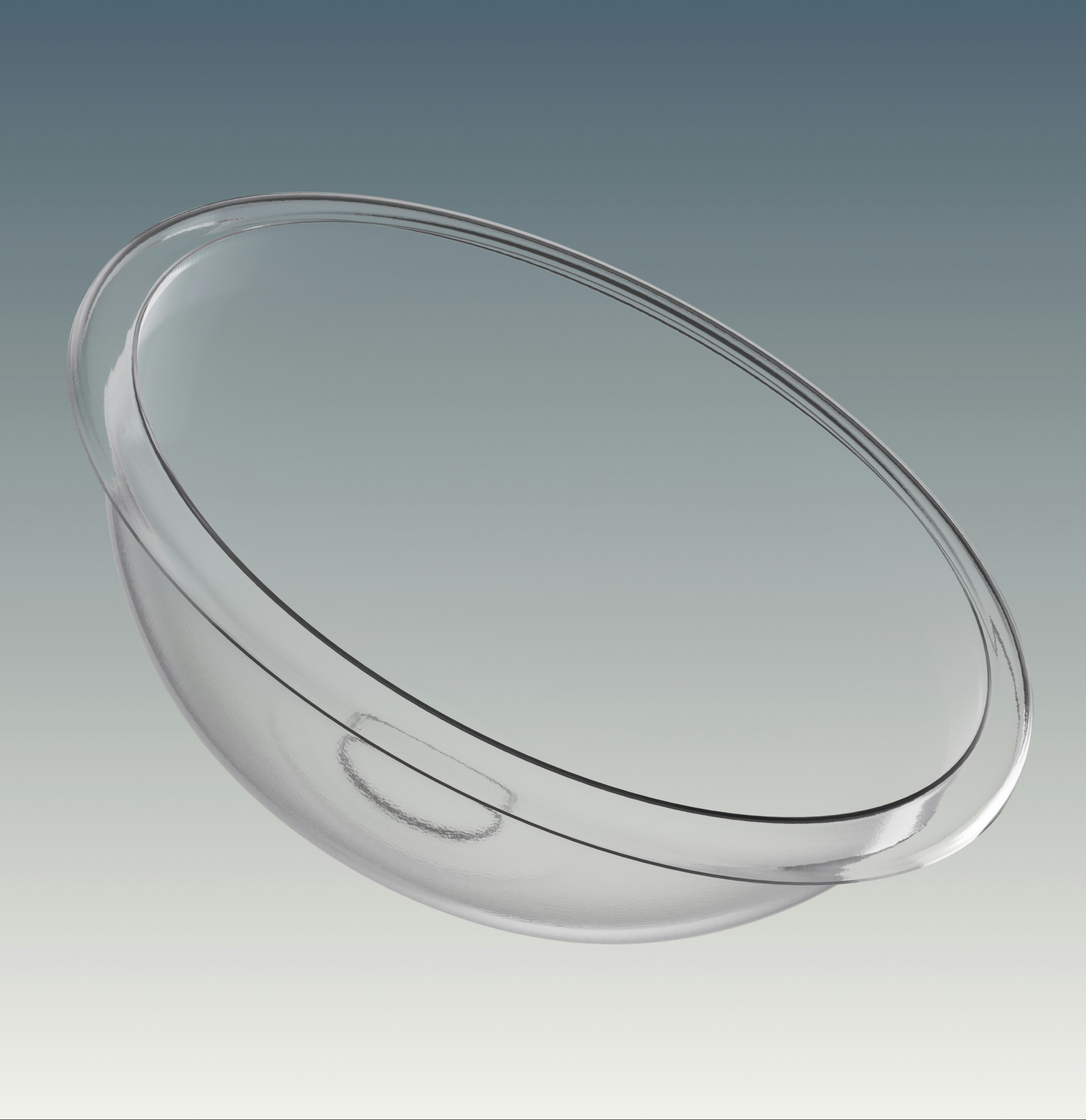 A clear glass bowl on a gradient background