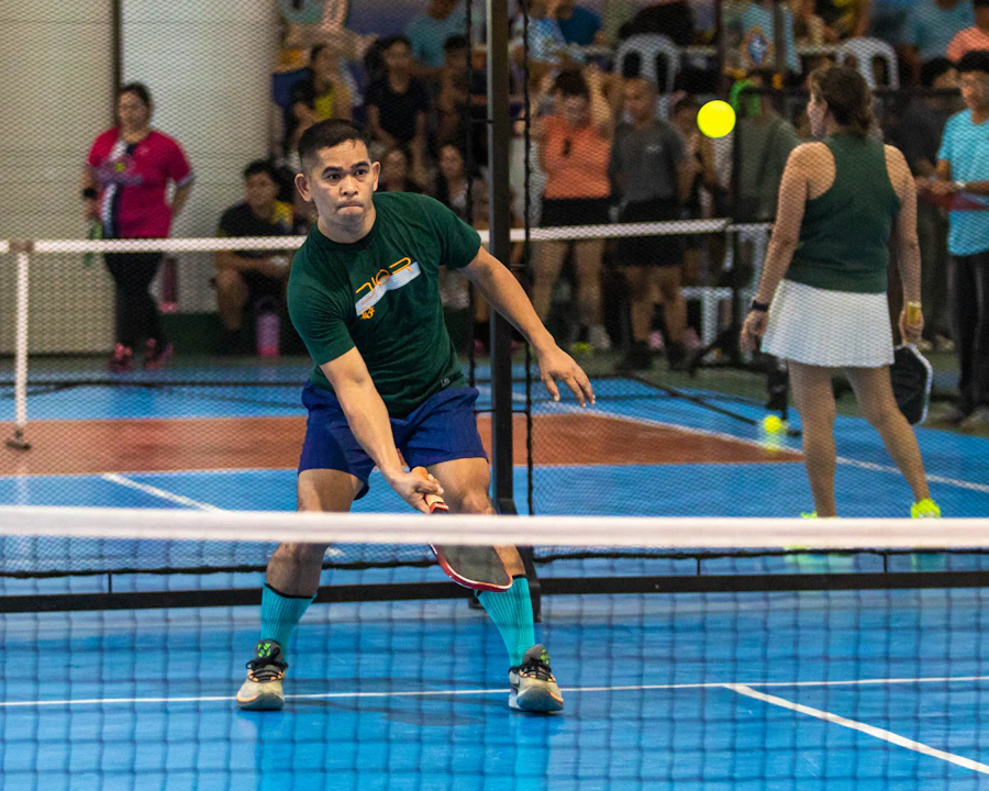 Stock photo: a busy indoor pickleball tournament