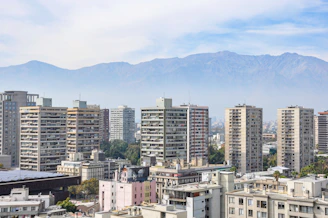 Apartment buildings with mountains in the background
