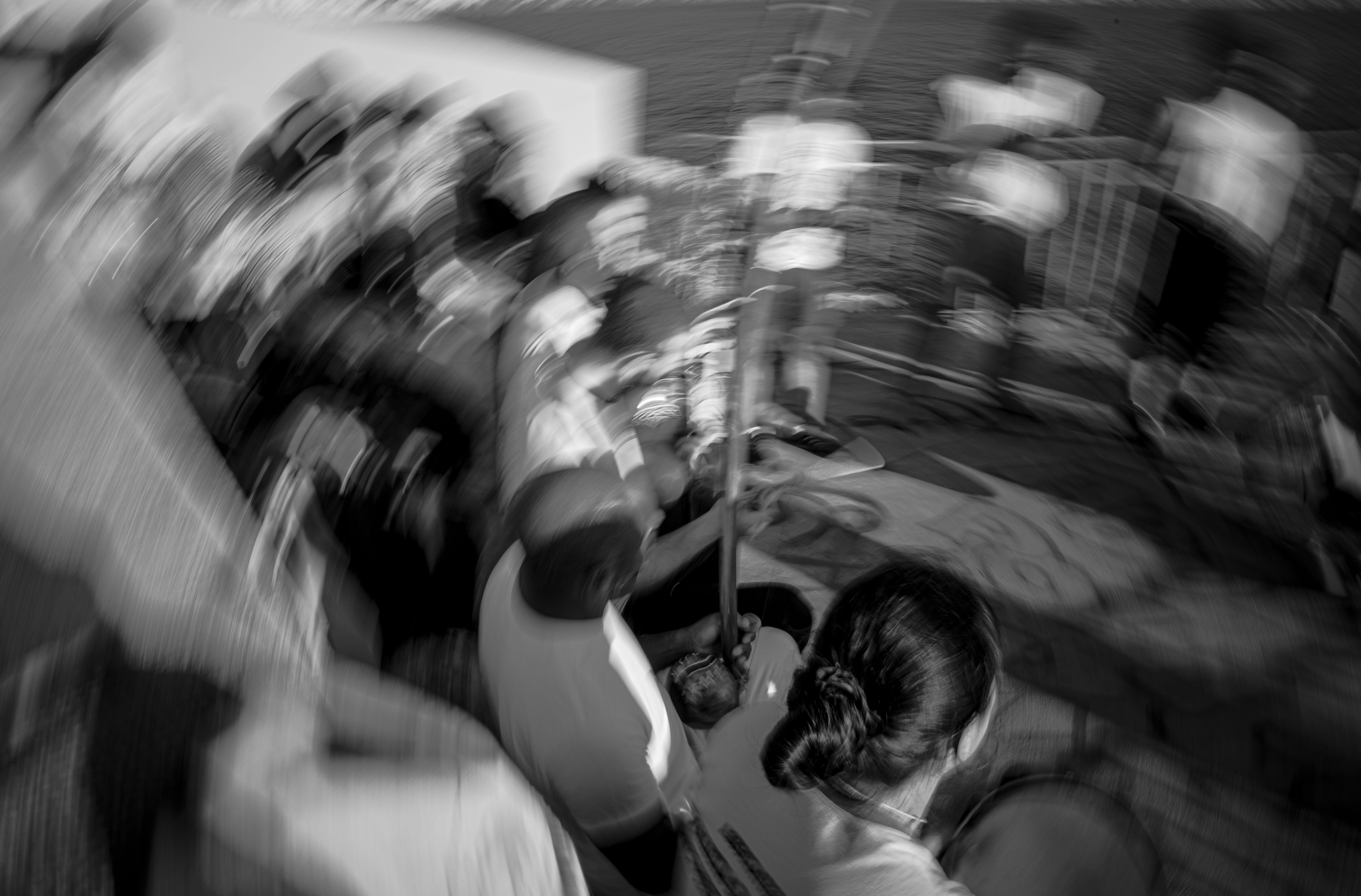 Blurred crowd of people in black and white