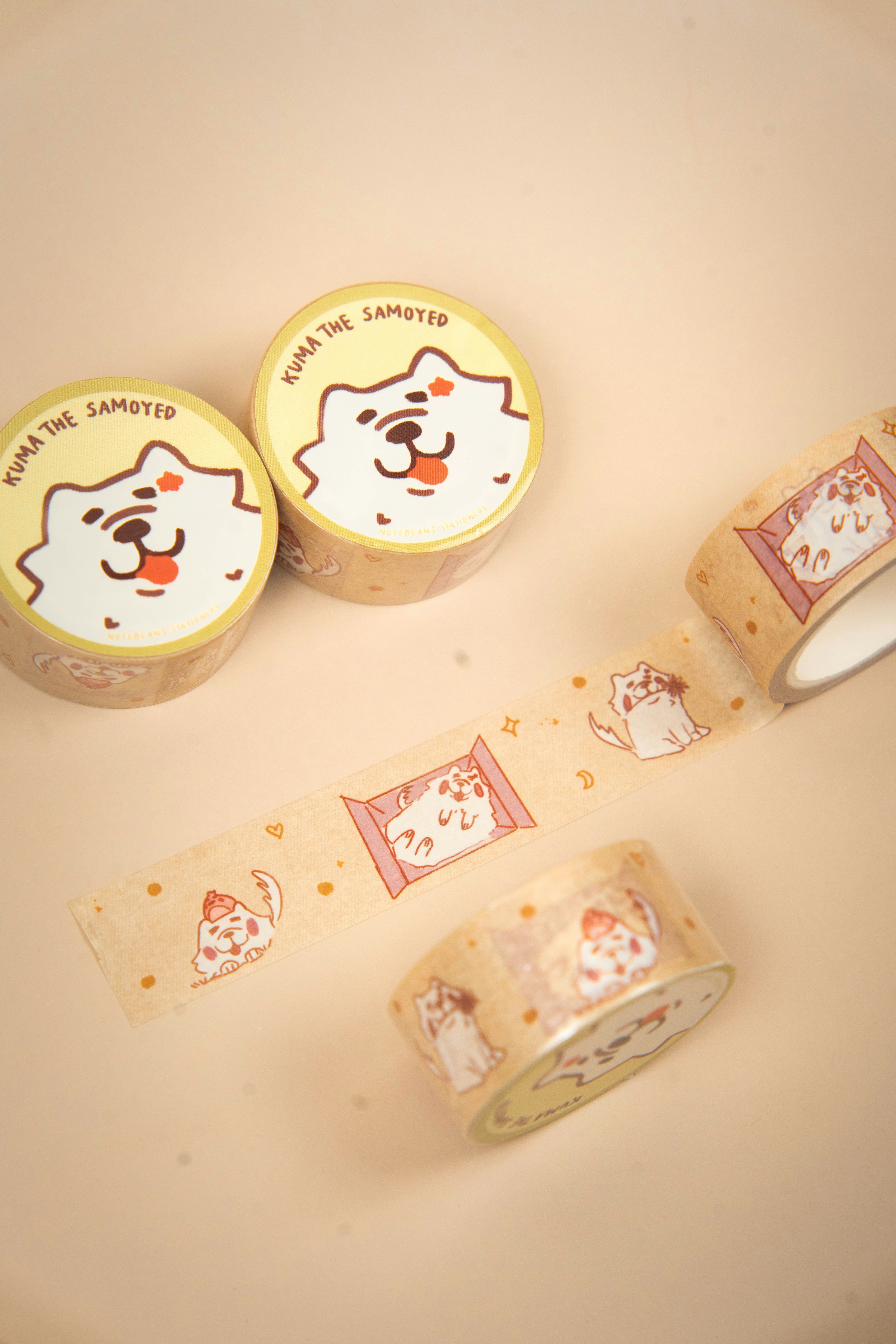 Rolls of decorative tape with cat illustrations.