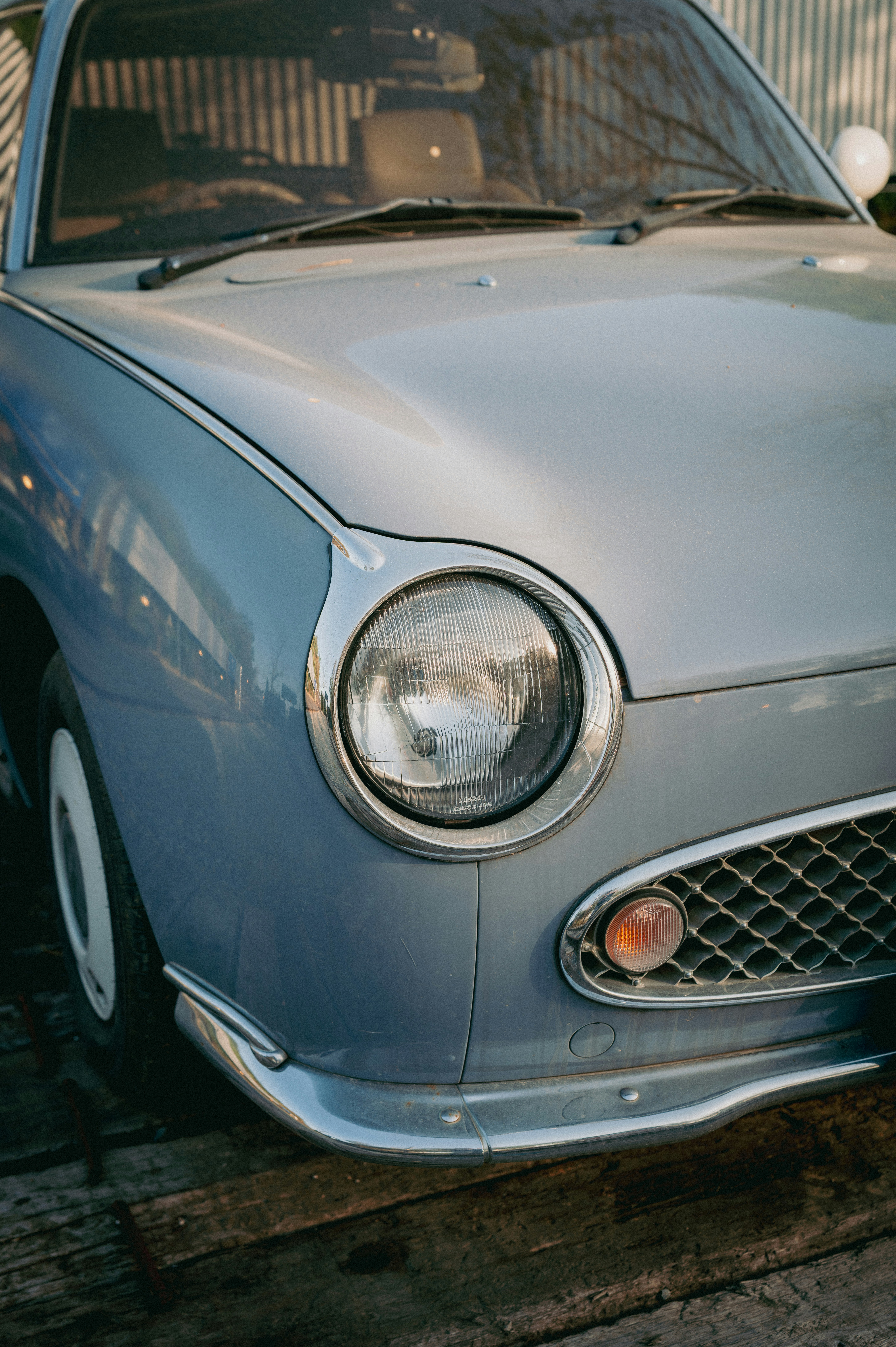 Close-up of a vintage light blue car
