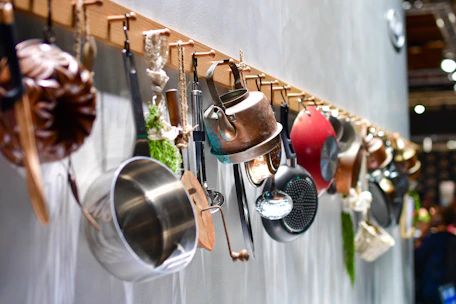 Various kitchen utensils hanging on a rack