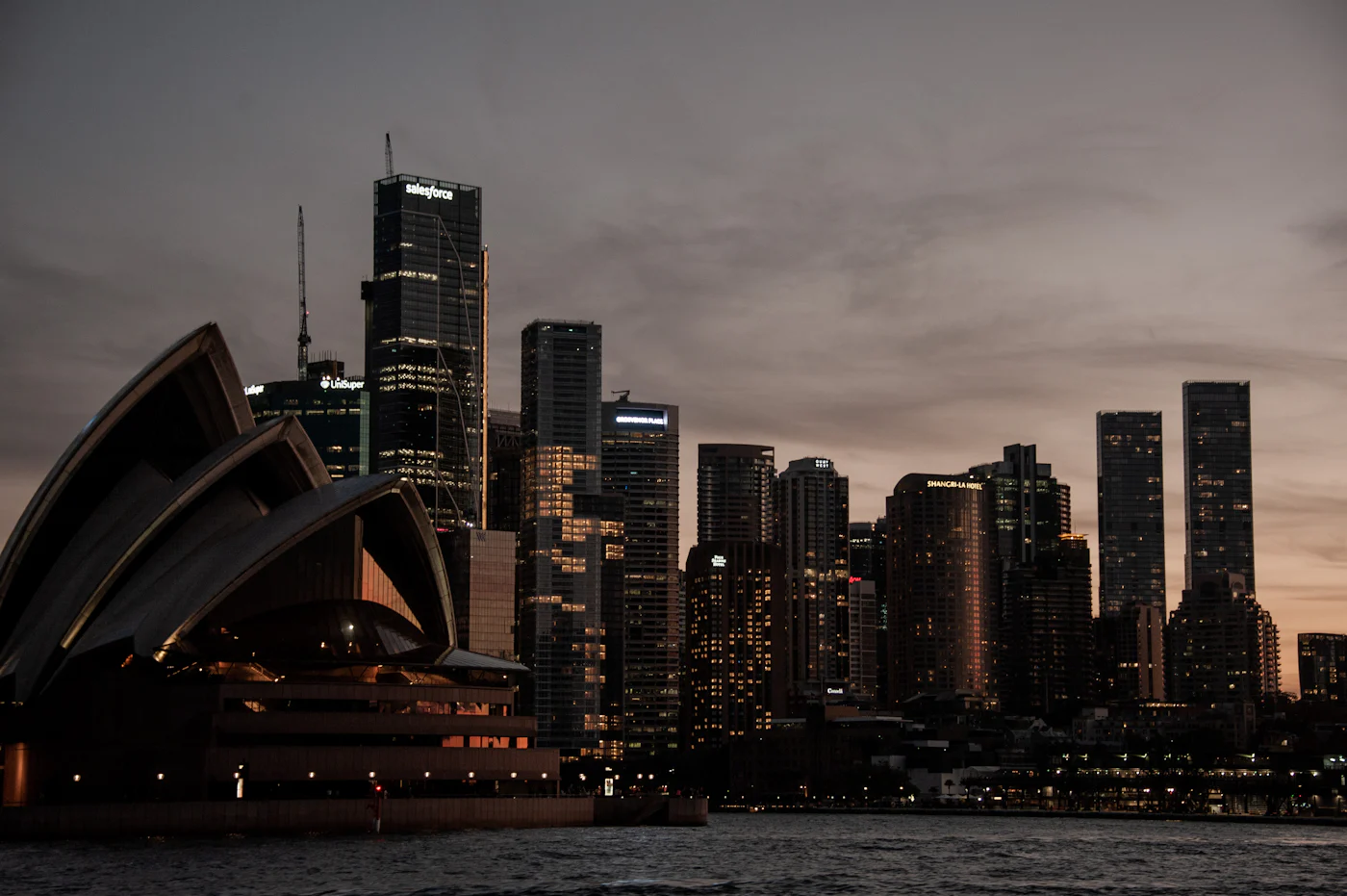 Sydney Opera House and city skyline at dusk