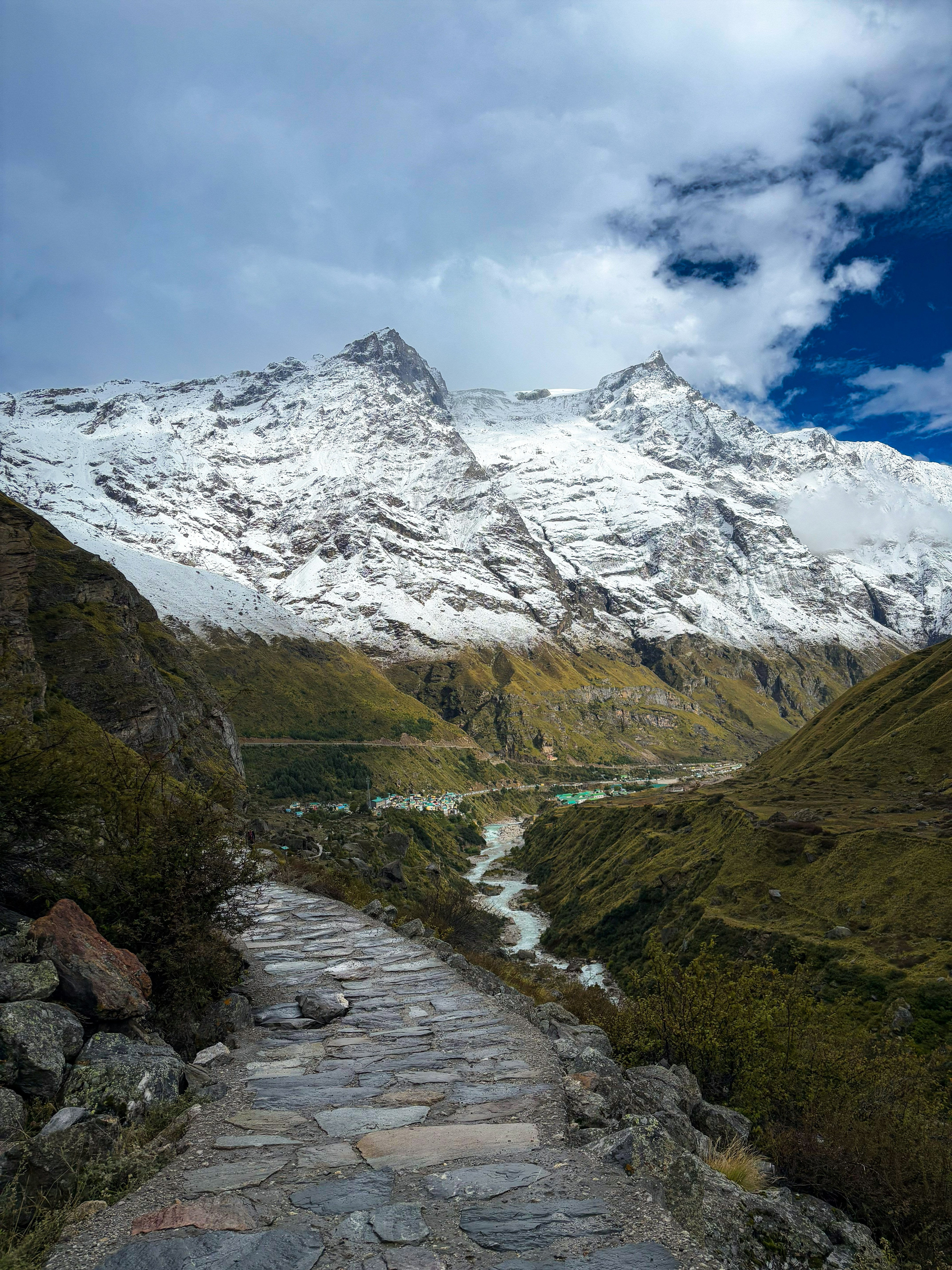 Traveler reviewing extreme activity insurance before a mountain expedition