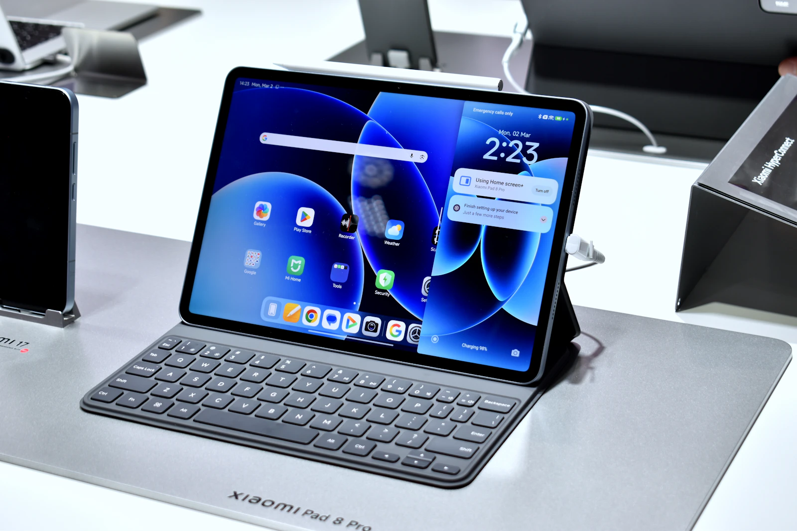 Tablet displayed with a keyboard and stylus