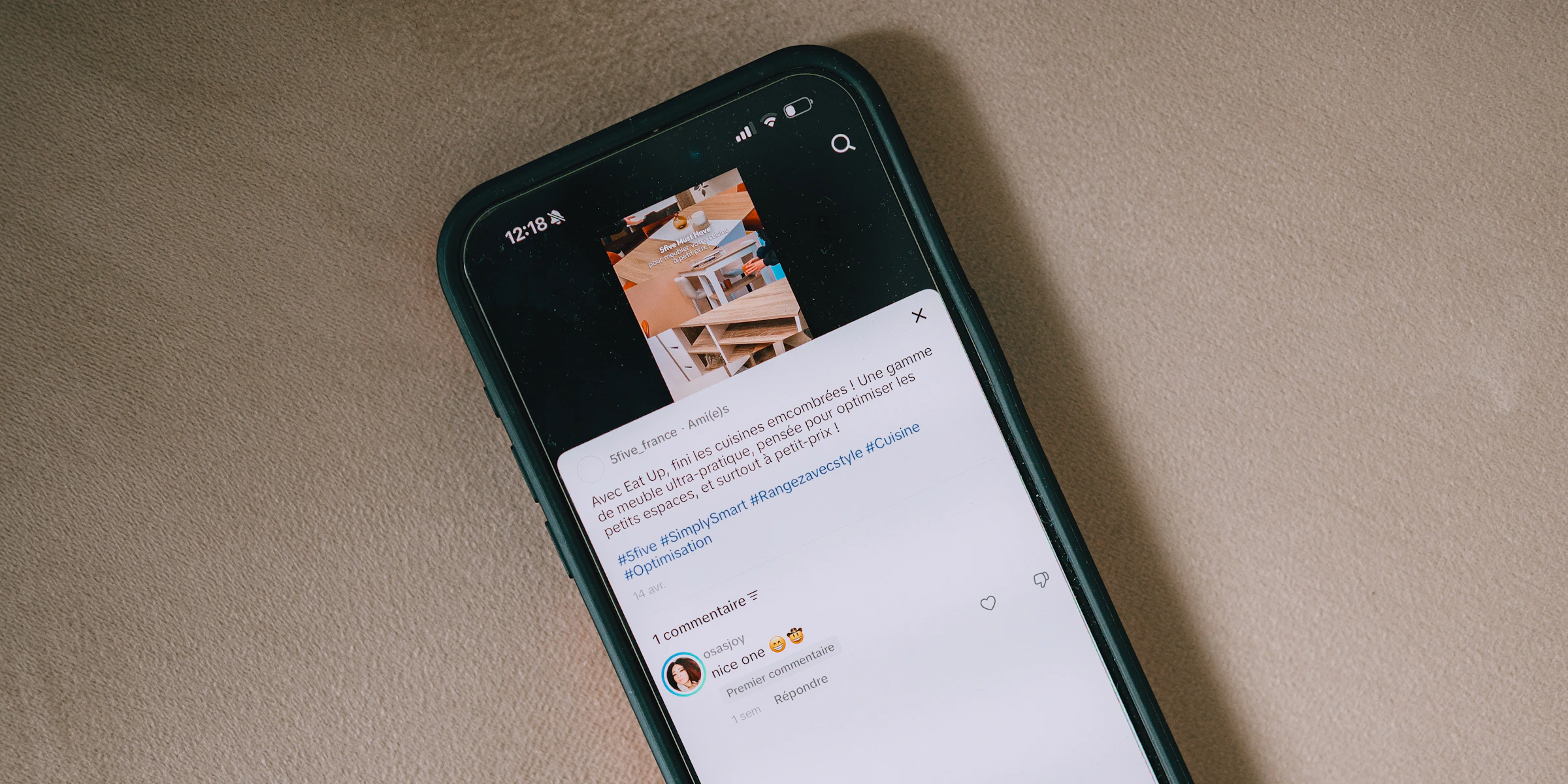 Smartphone displaying a visual social-media discovery feed