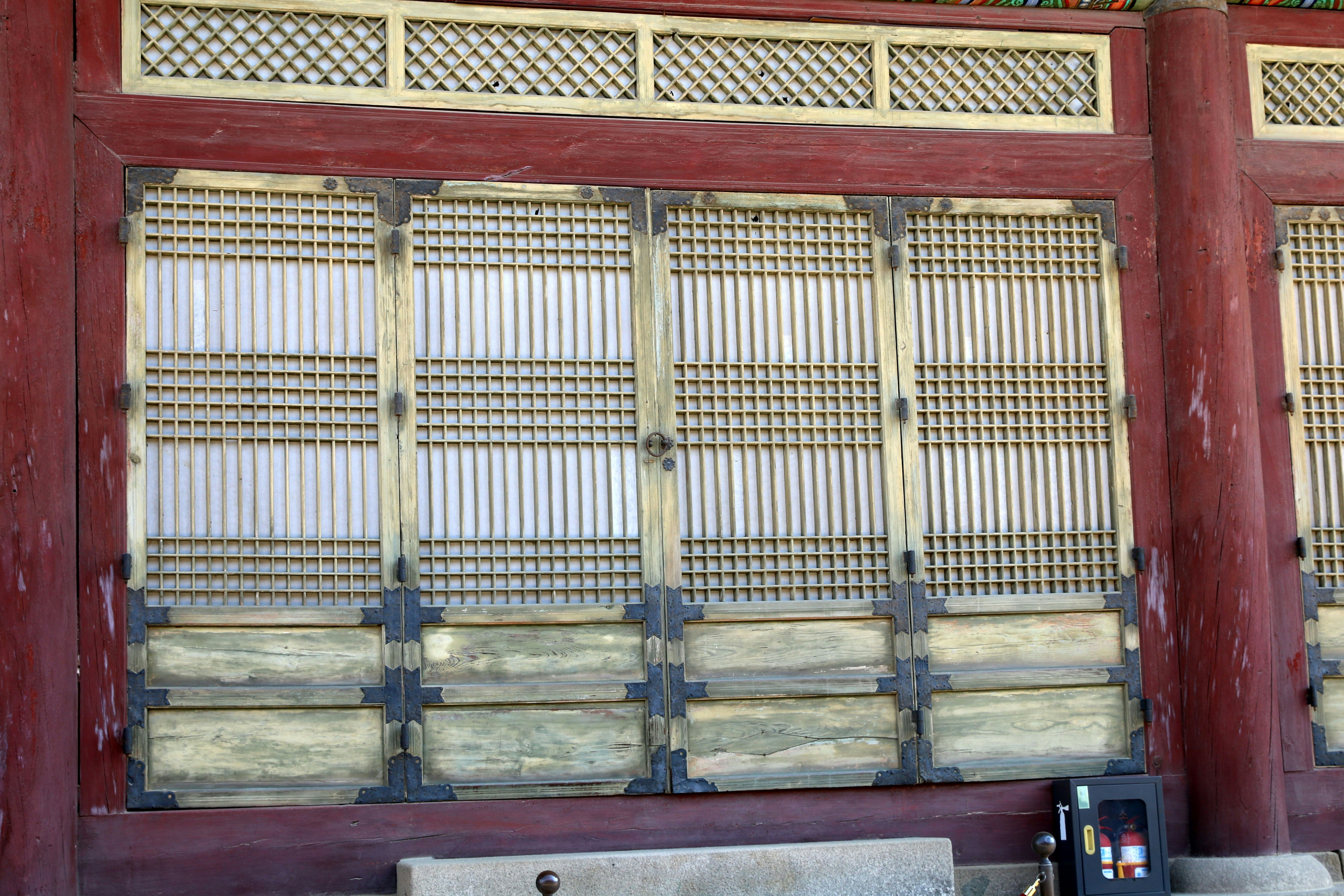Traditional korean wooden doors with lattice patterns