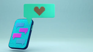 Smartphone displaying chat bubbles with a heart icon