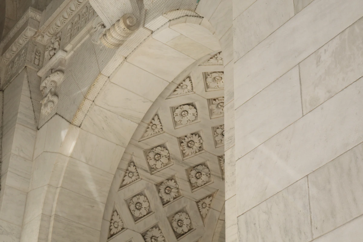 Hallway with a textured stone panel wall