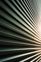Abstract pattern of metal siding with sunlight