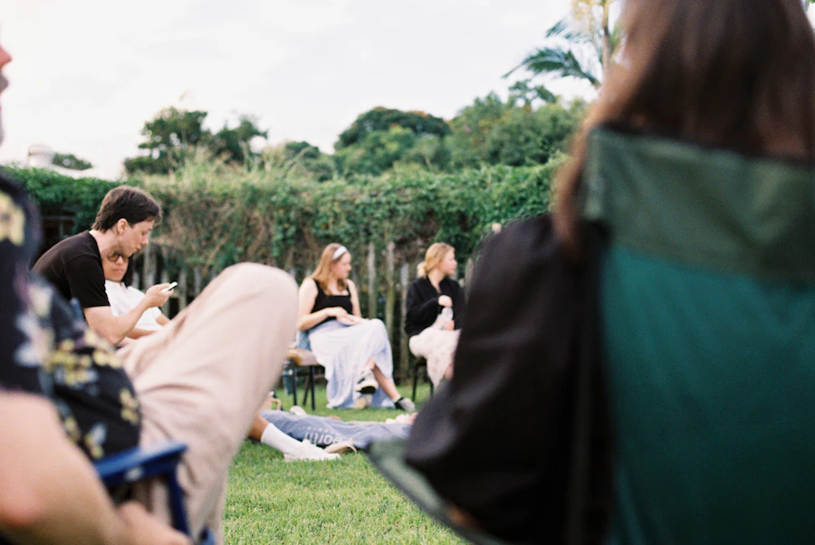 Friends gathered outdoors on a sunny day