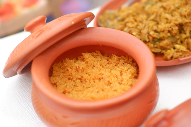 Clay pot of smoky jollof rice