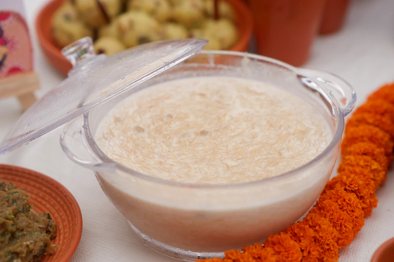 Golden creamy rice pudding in a glass dish