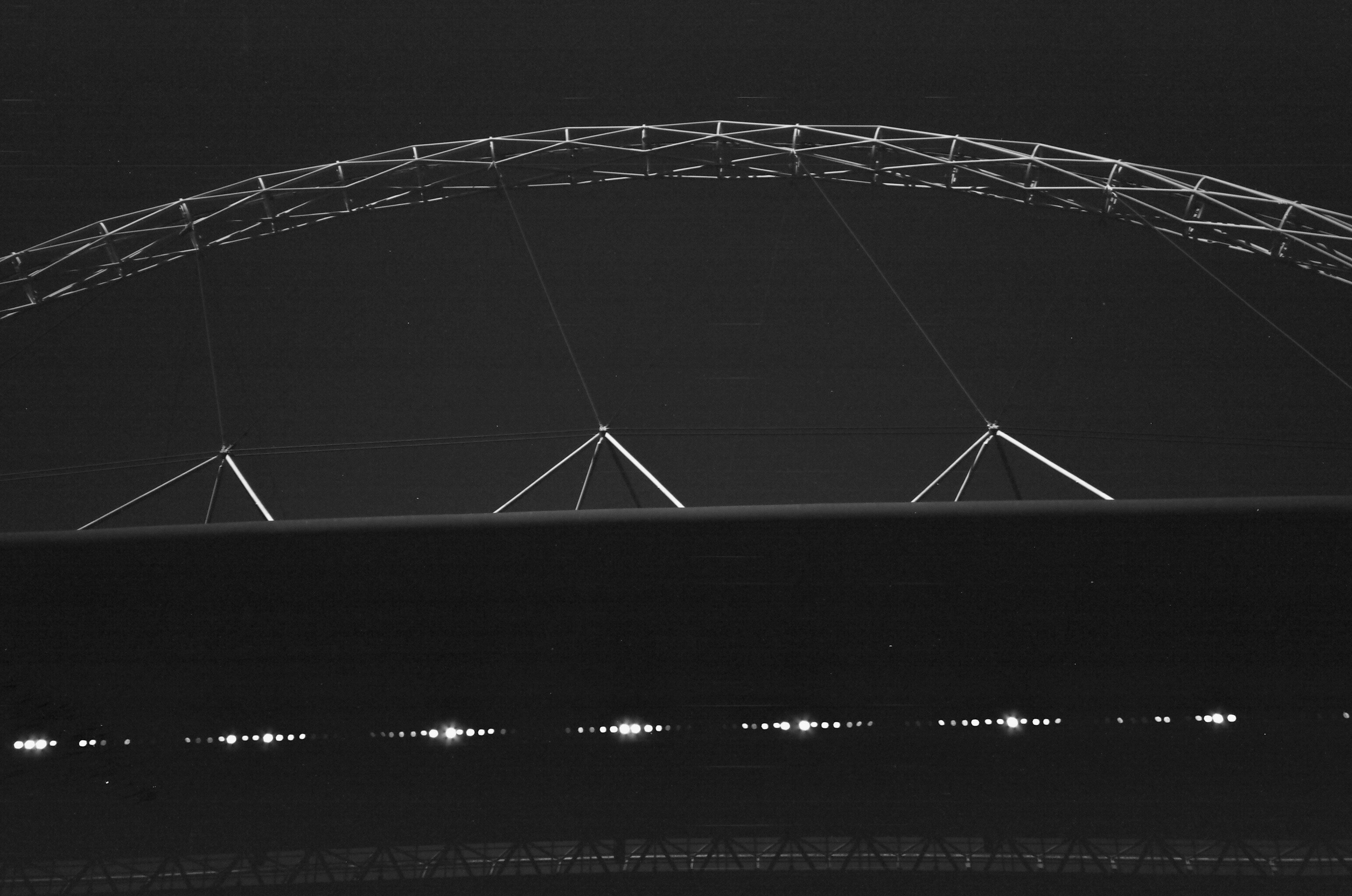 Modern stadium architecture at night