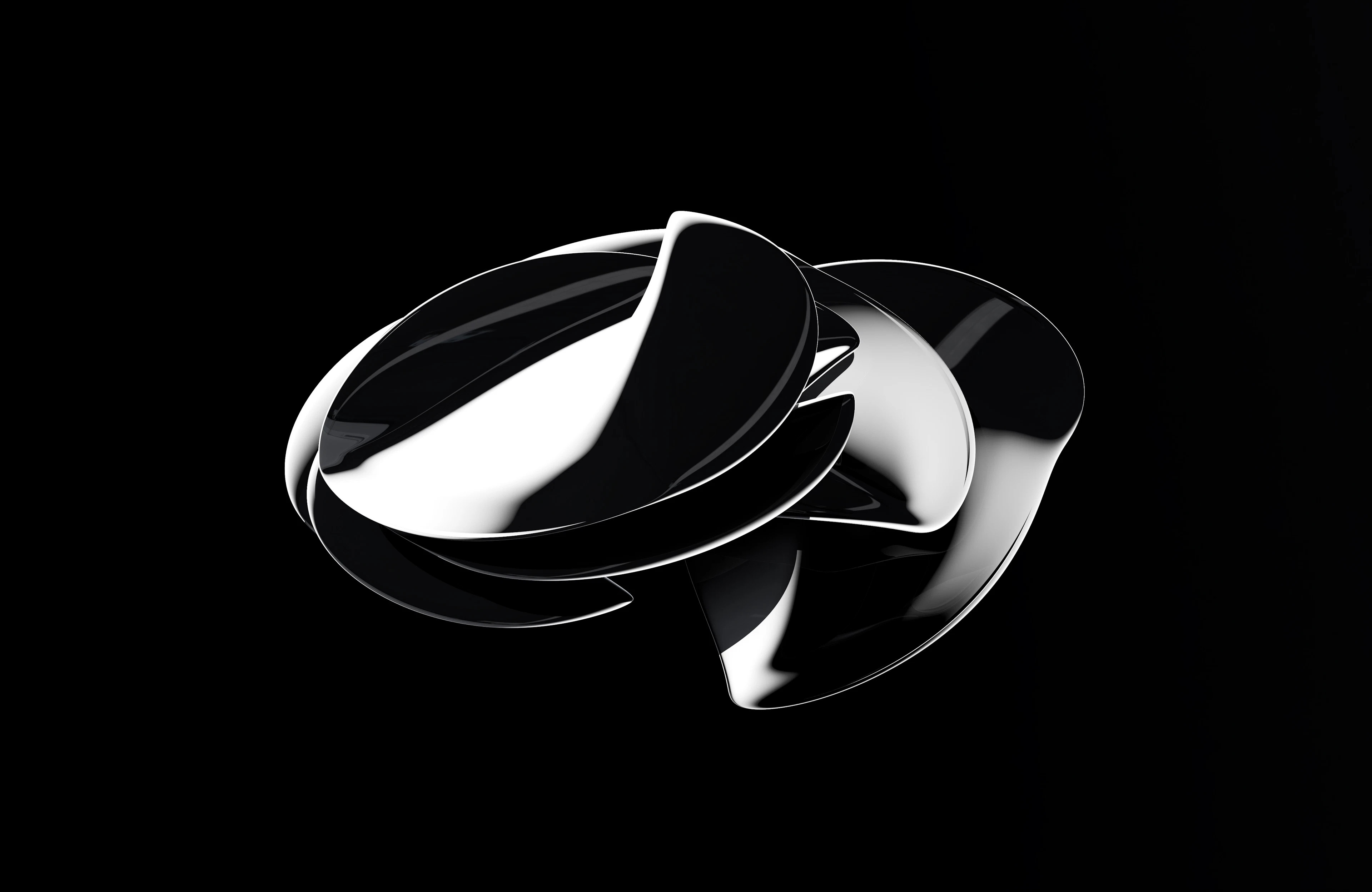 Abstract chrome sculpture against black